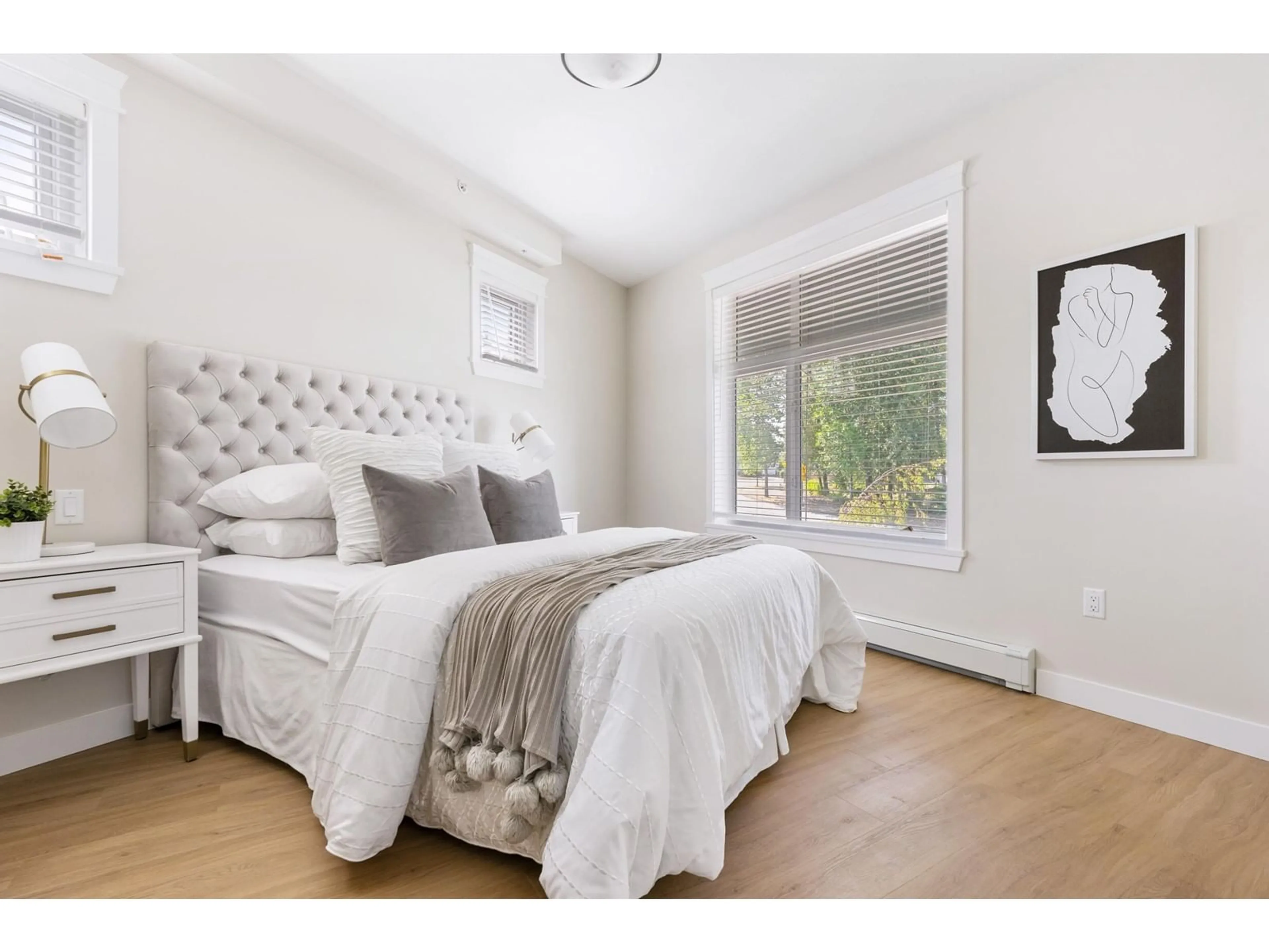 Bedroom with bed, wood/laminate floor for 317 - 20932 83, Langley British Columbia V0V0V0