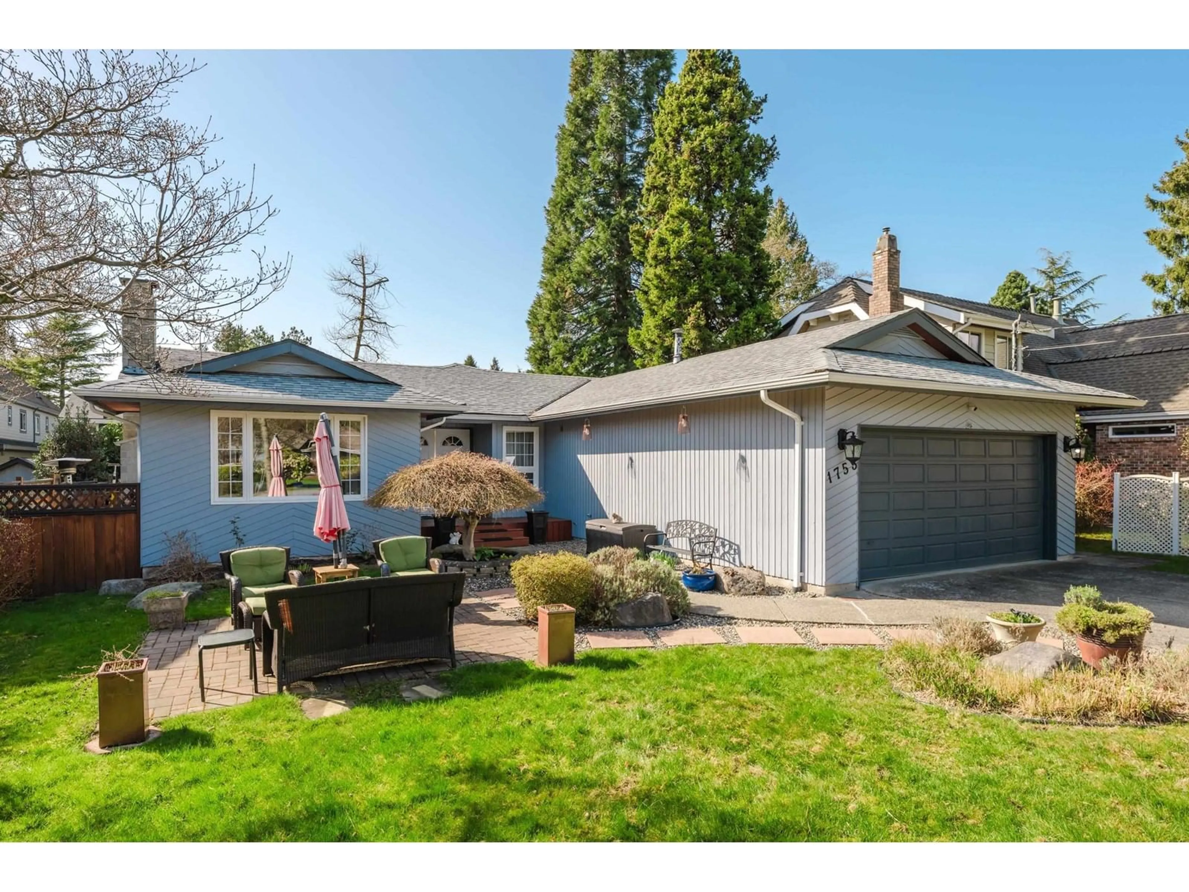 Home with vinyl exterior material, street for 1753 146, Surrey British Columbia V4A5V4