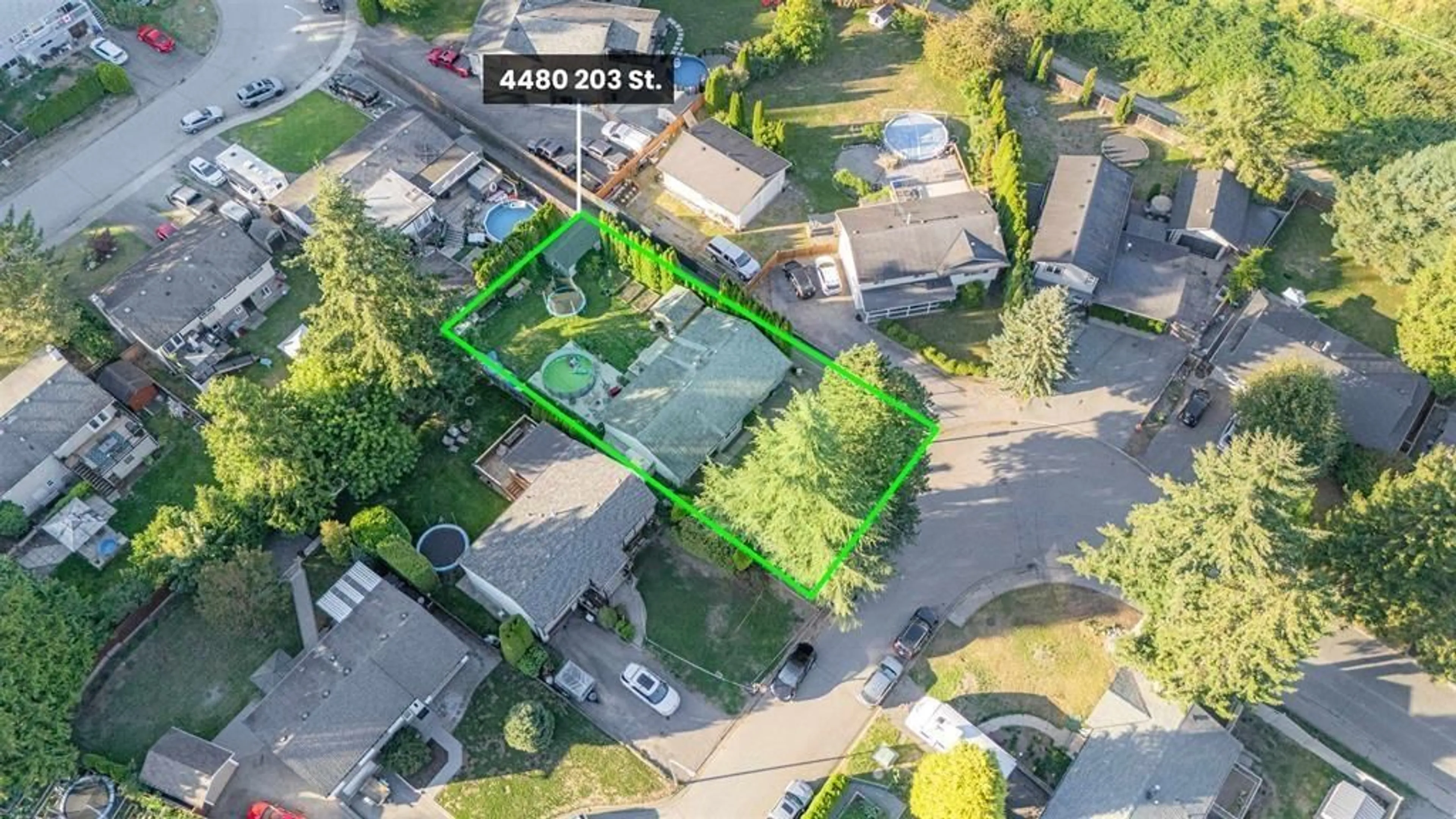 A pic from outside/outdoor area/front of a property/back of a property/a pic from drone, street for 4480 203, Langley British Columbia V3A6P7