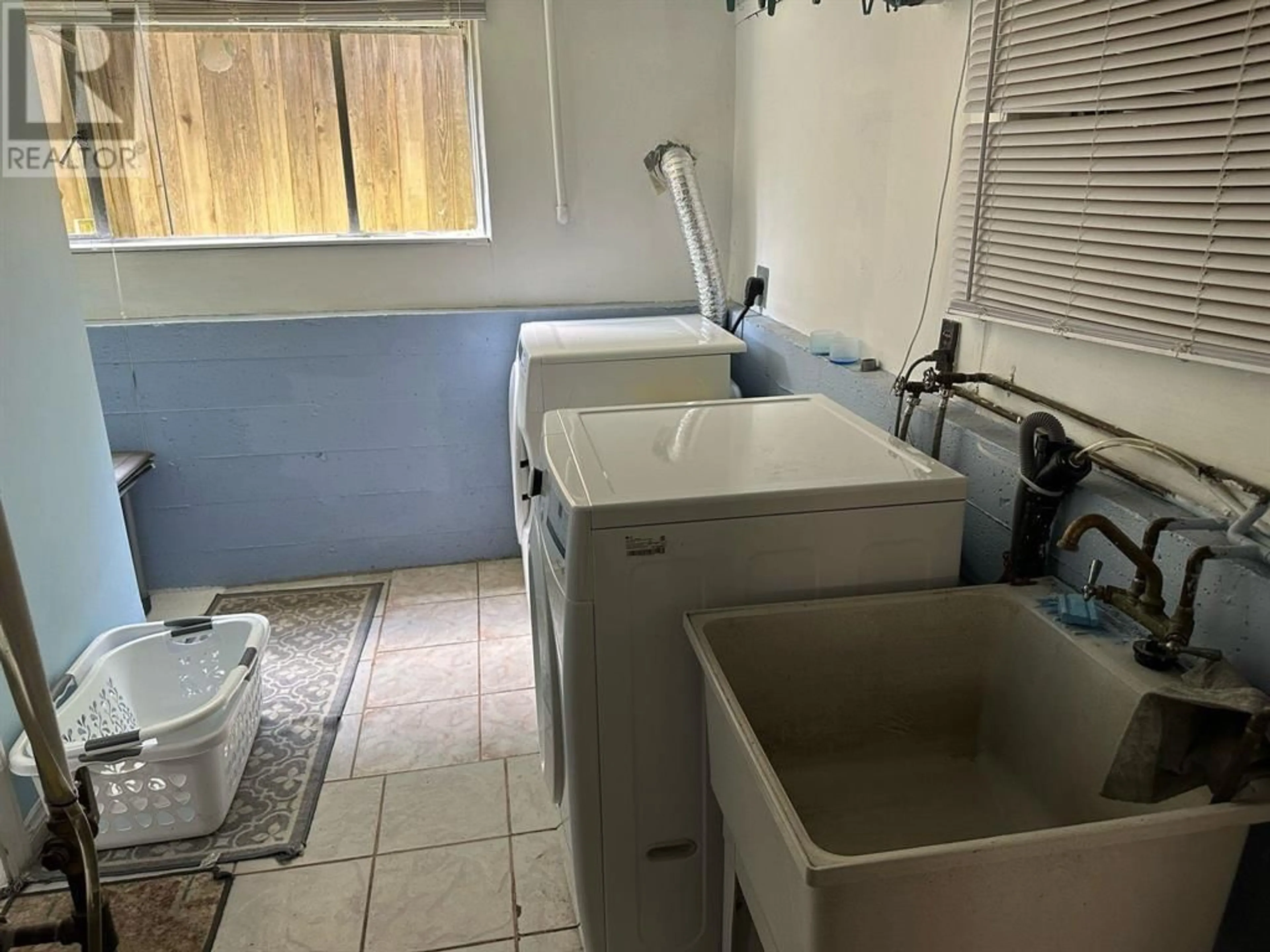 Laundry room for 645 E 27 AVENUE, Vancouver British Columbia V5V2K7