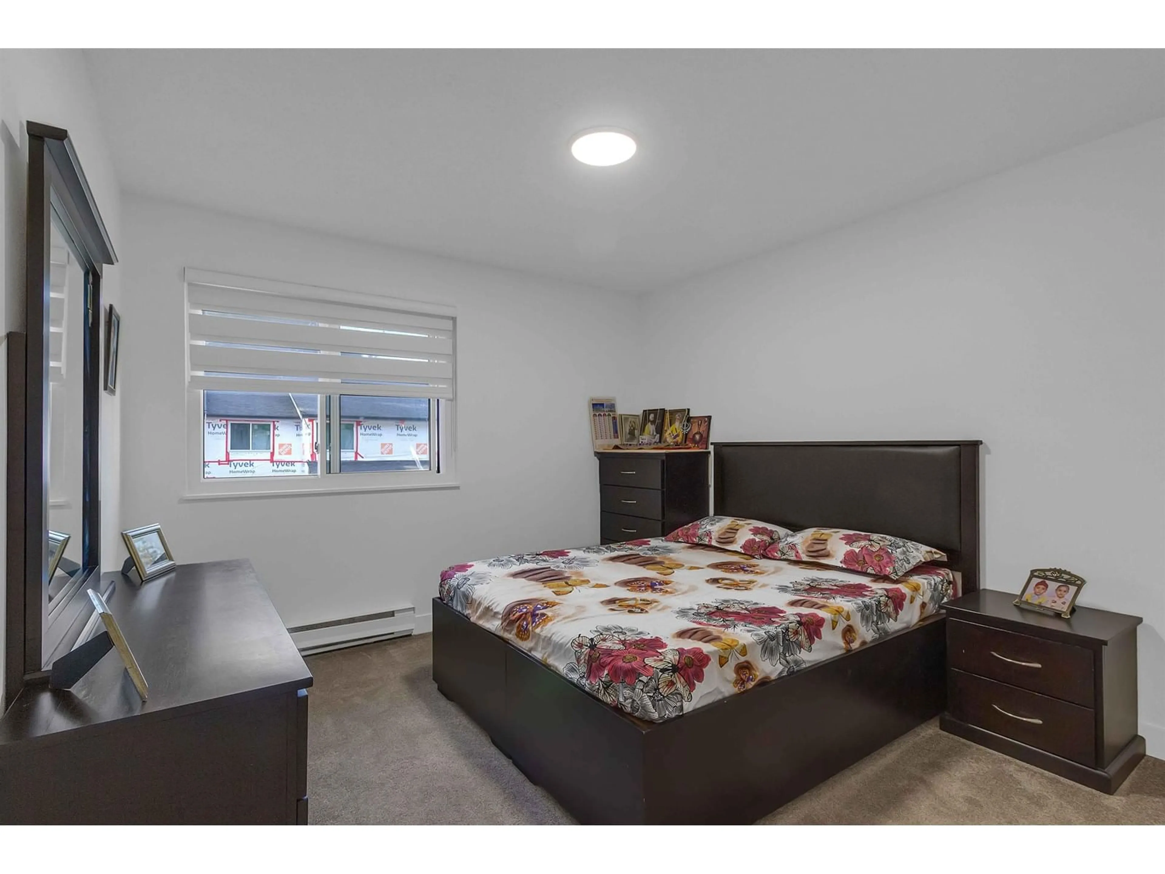 Bedroom with bed, wood/laminate floor for 138 - 7321 140, Surrey British Columbia V3W5J6