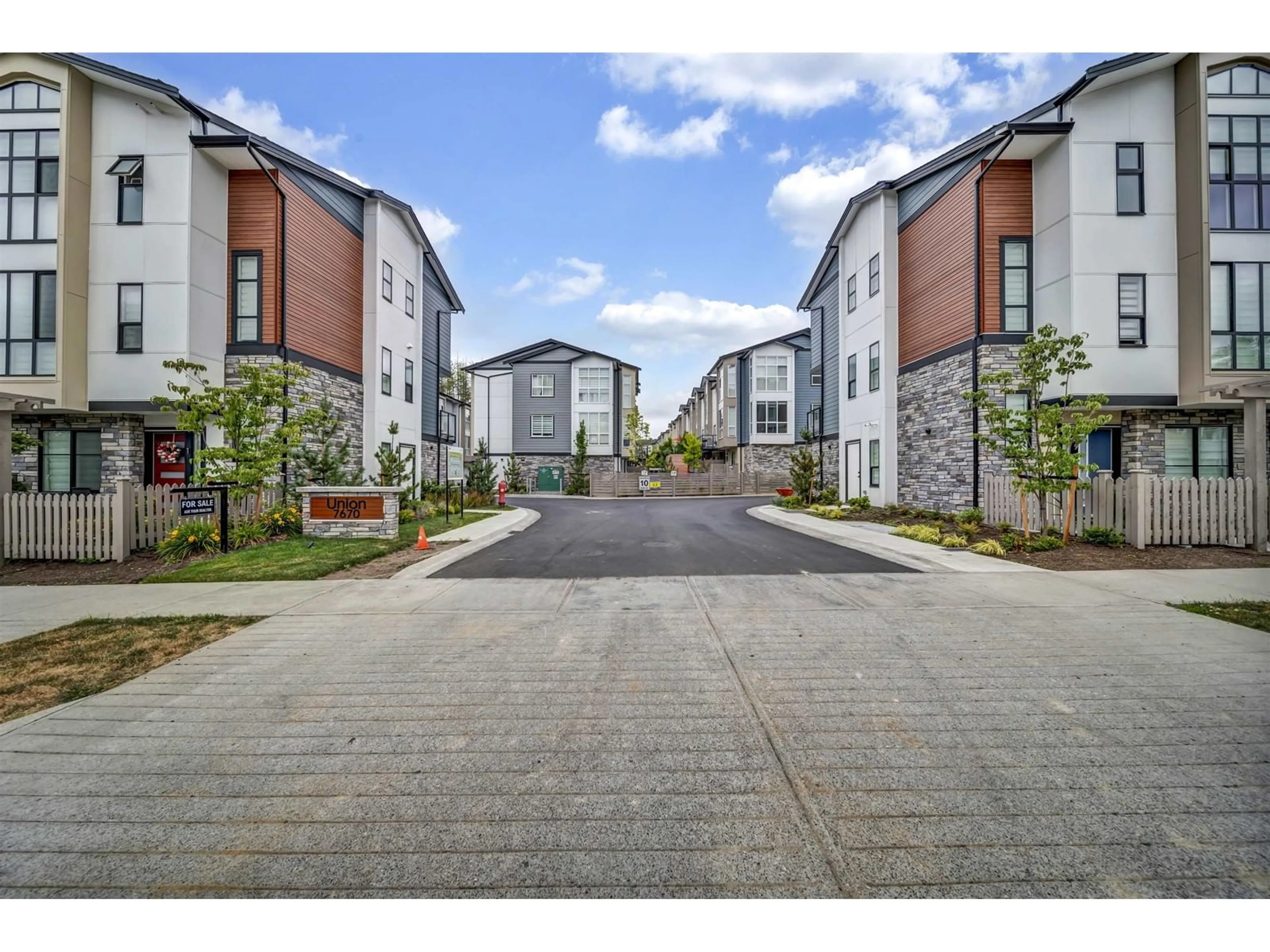 A pic from outside/outdoor area/front of a property/back of a property/a pic from drone, street for 14 - 7670 207, Langley British Columbia V2Y3N7