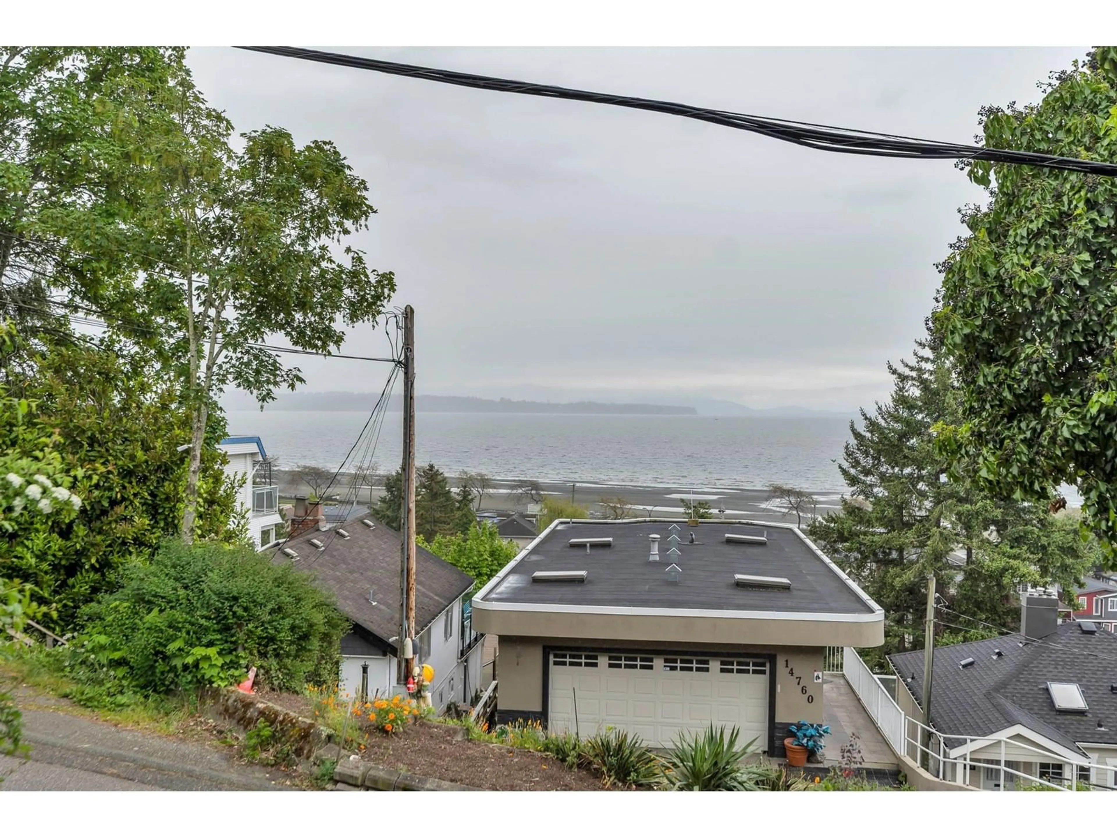 A pic from outside/outdoor area/front of a property/back of a property/a pic from drone, water/lake/river/ocean view for 14763 MCDONALD, White Rock British Columbia V4B2C7