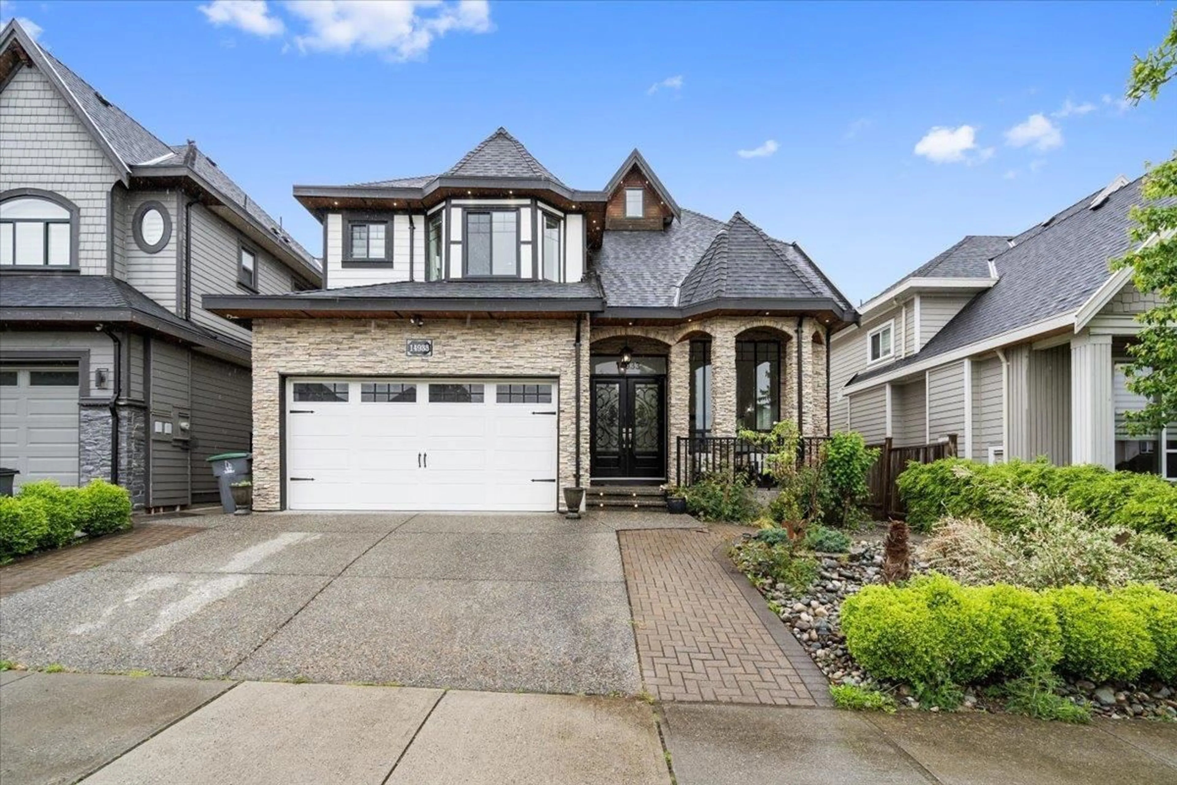 Home with vinyl exterior material, street for 14933 69A, Surrey British Columbia V3S0Y9