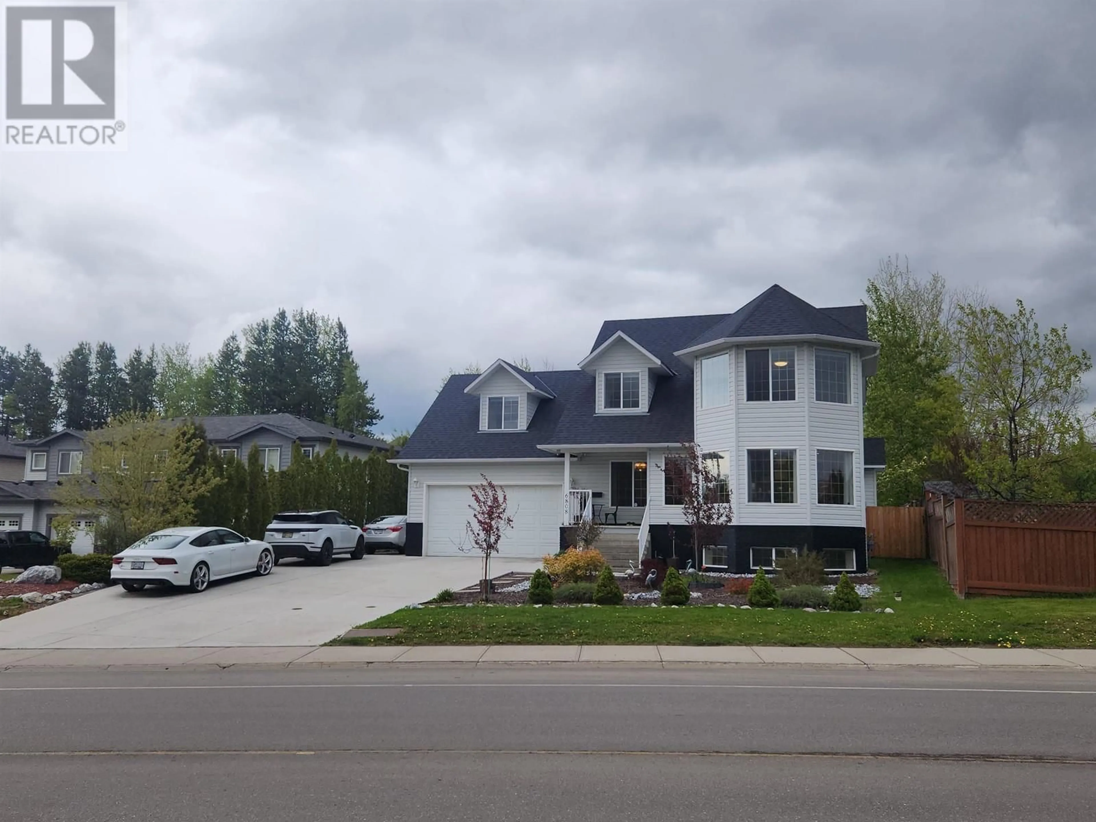 Home with vinyl exterior material, street for 6808 WESTGATE AVENUE, Prince George British Columbia V2N5R2