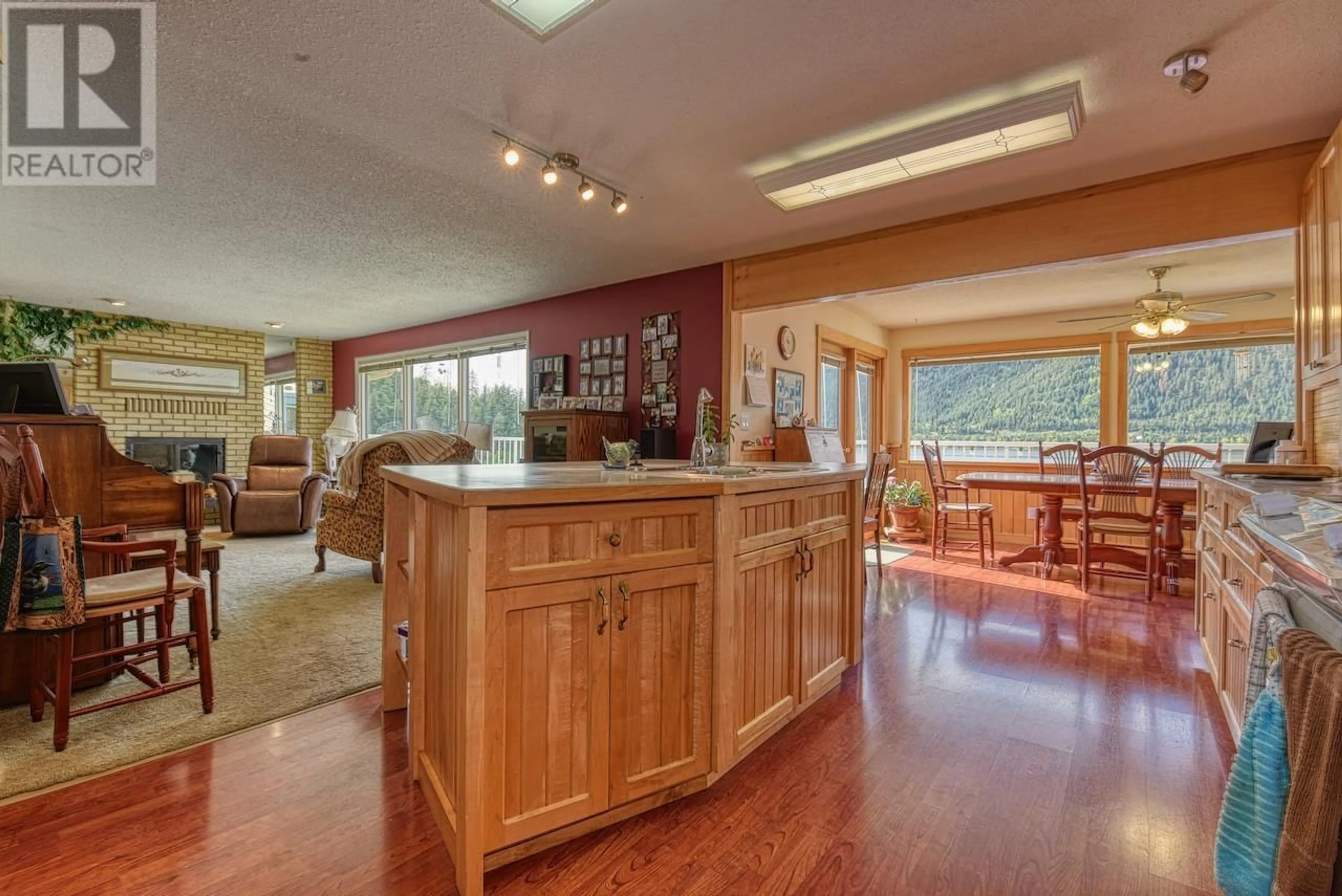 Open concept kitchen, wood/laminate floor for 111 FOWLER ROAD, Williams Lake British Columbia V2G5G7