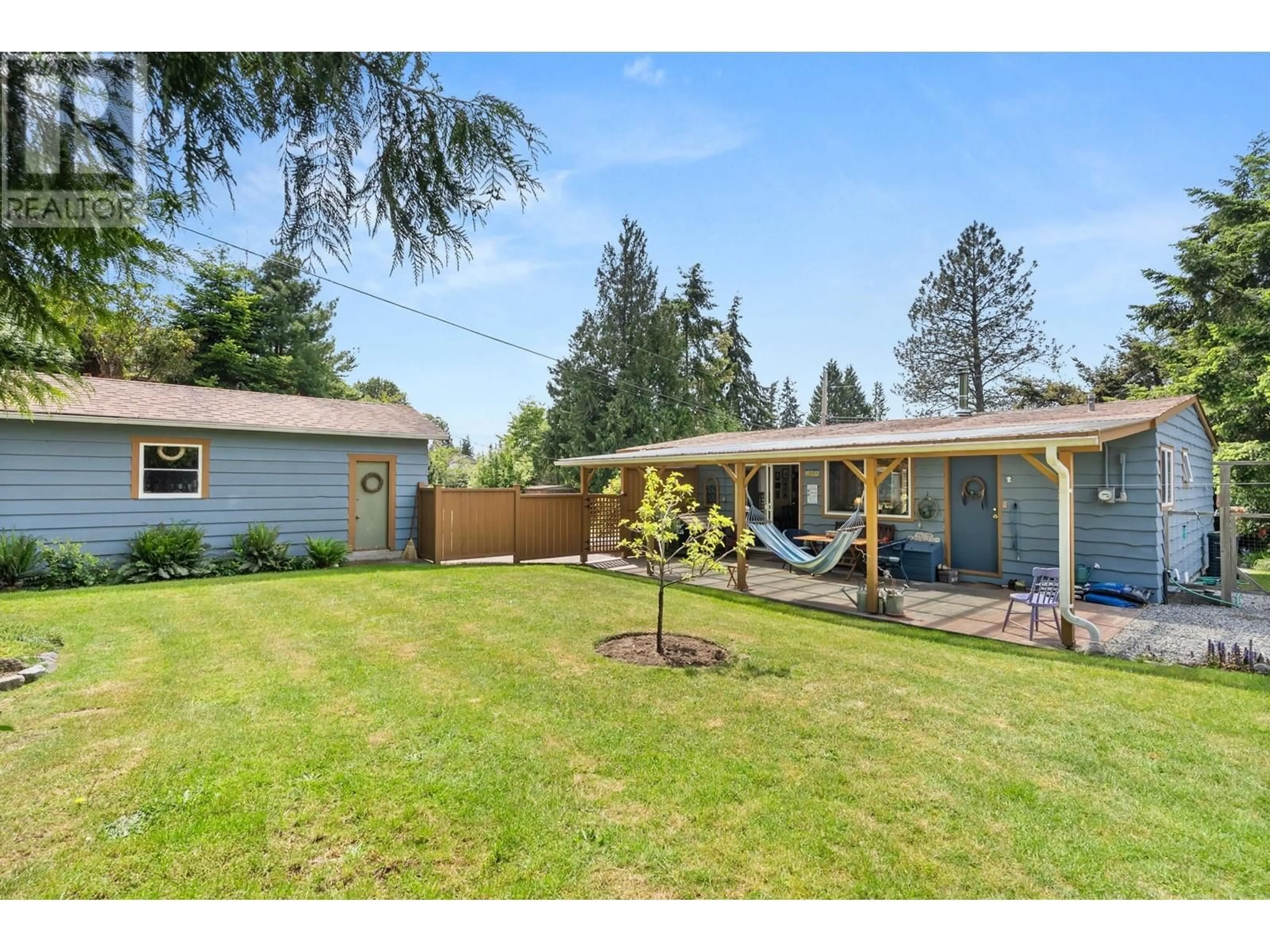 A pic from outside/outdoor area/front of a property/back of a property/a pic from drone, street for 5288 SNODGRASS ROAD, Sechelt British Columbia V7Z0C1