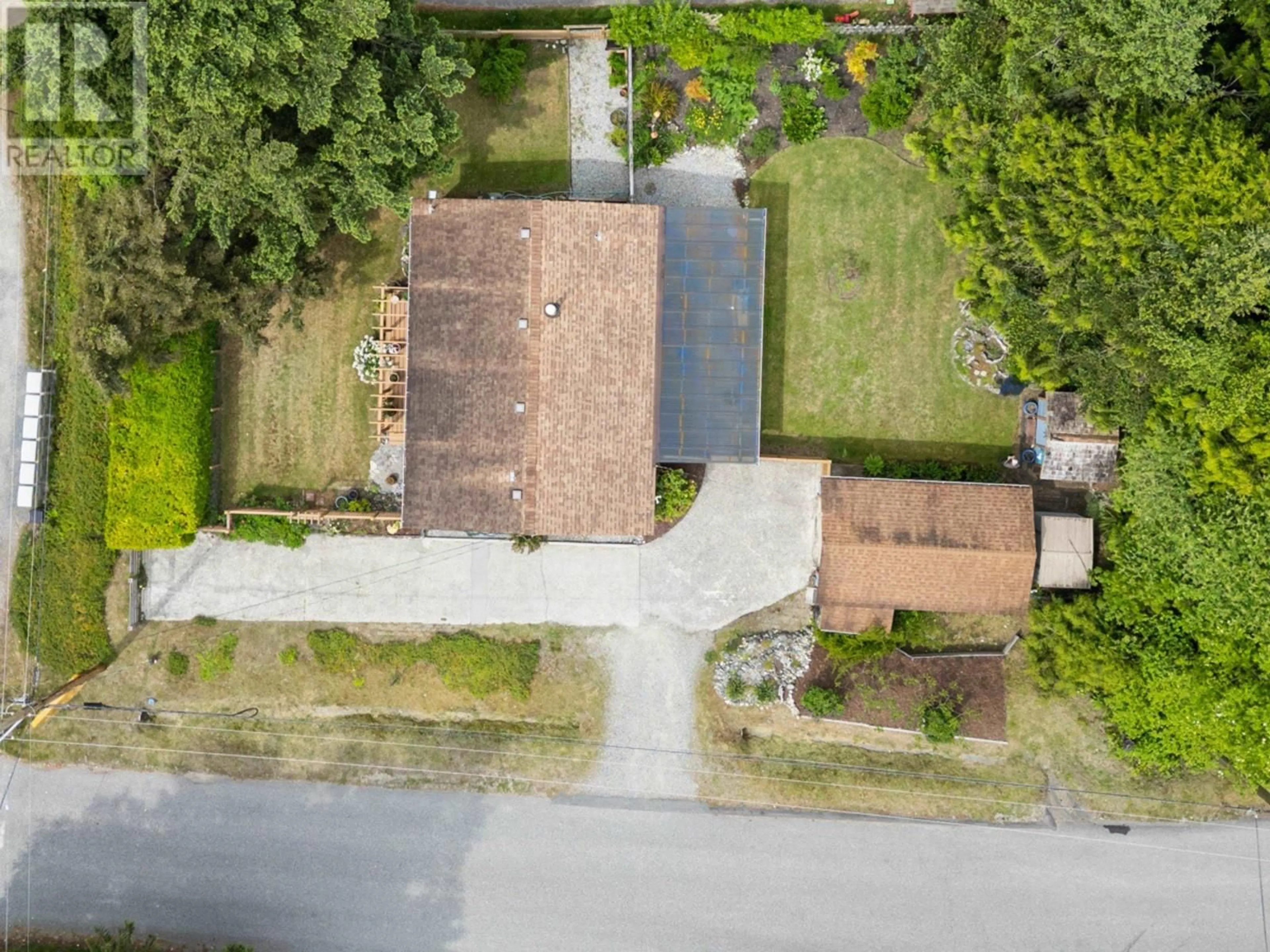A pic from outside/outdoor area/front of a property/back of a property/a pic from drone, street for 5288 SNODGRASS ROAD, Sechelt British Columbia V7Z0C1