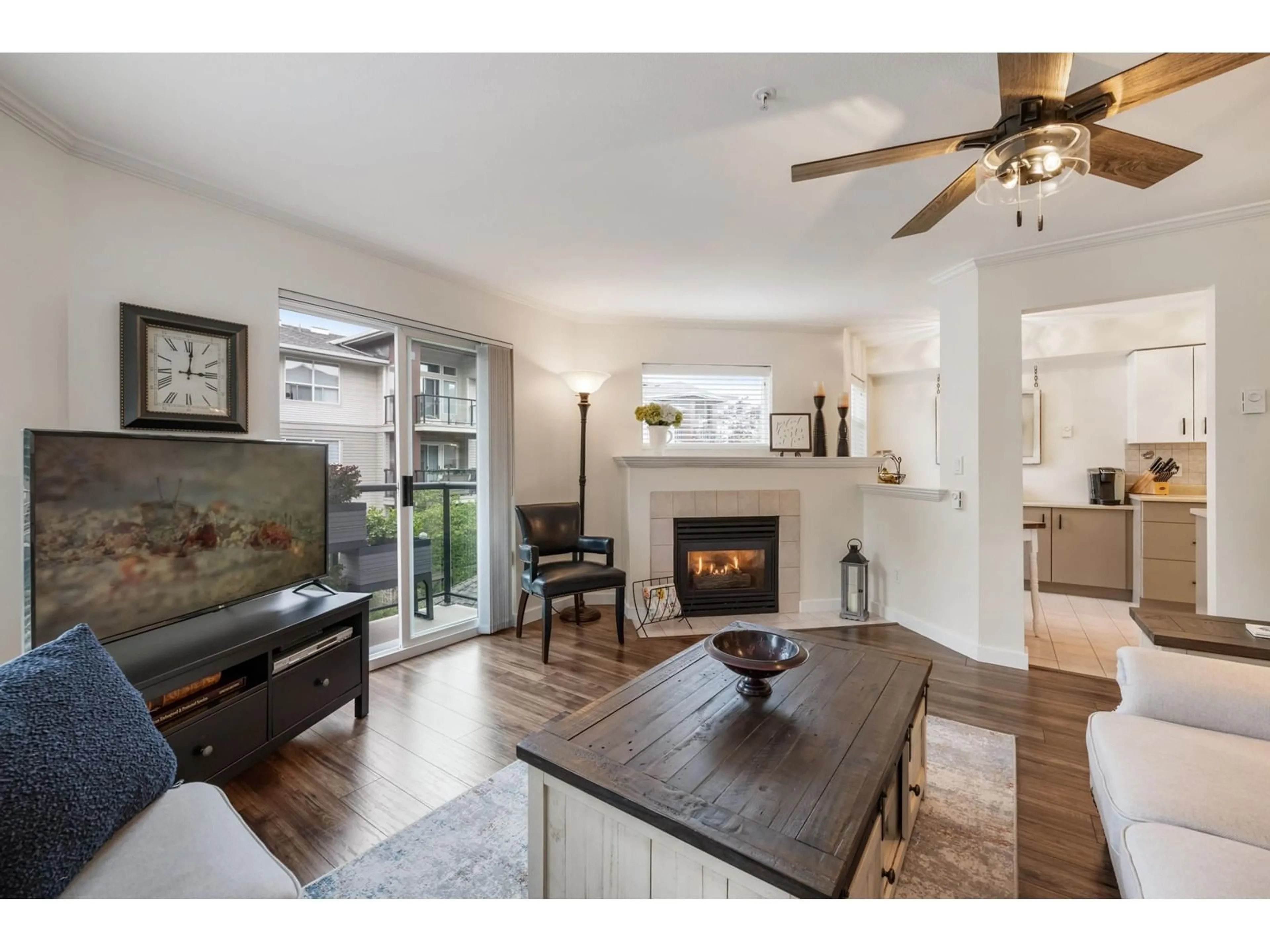 Living room with furniture, wood/laminate floor for 311 - 20259 MICHAUD, Langley British Columbia V3A8L1