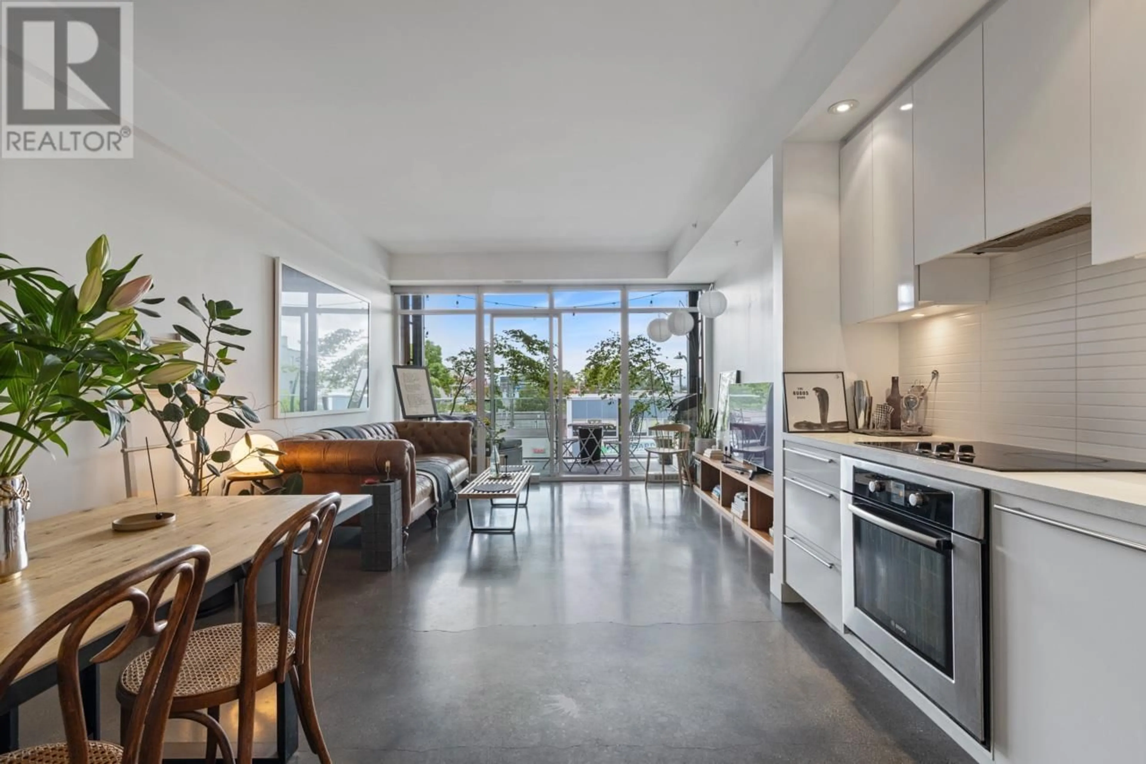 Open concept kitchen, cement floor for 306 - 256 2ND AVENUE, Vancouver British Columbia V5T0A7
