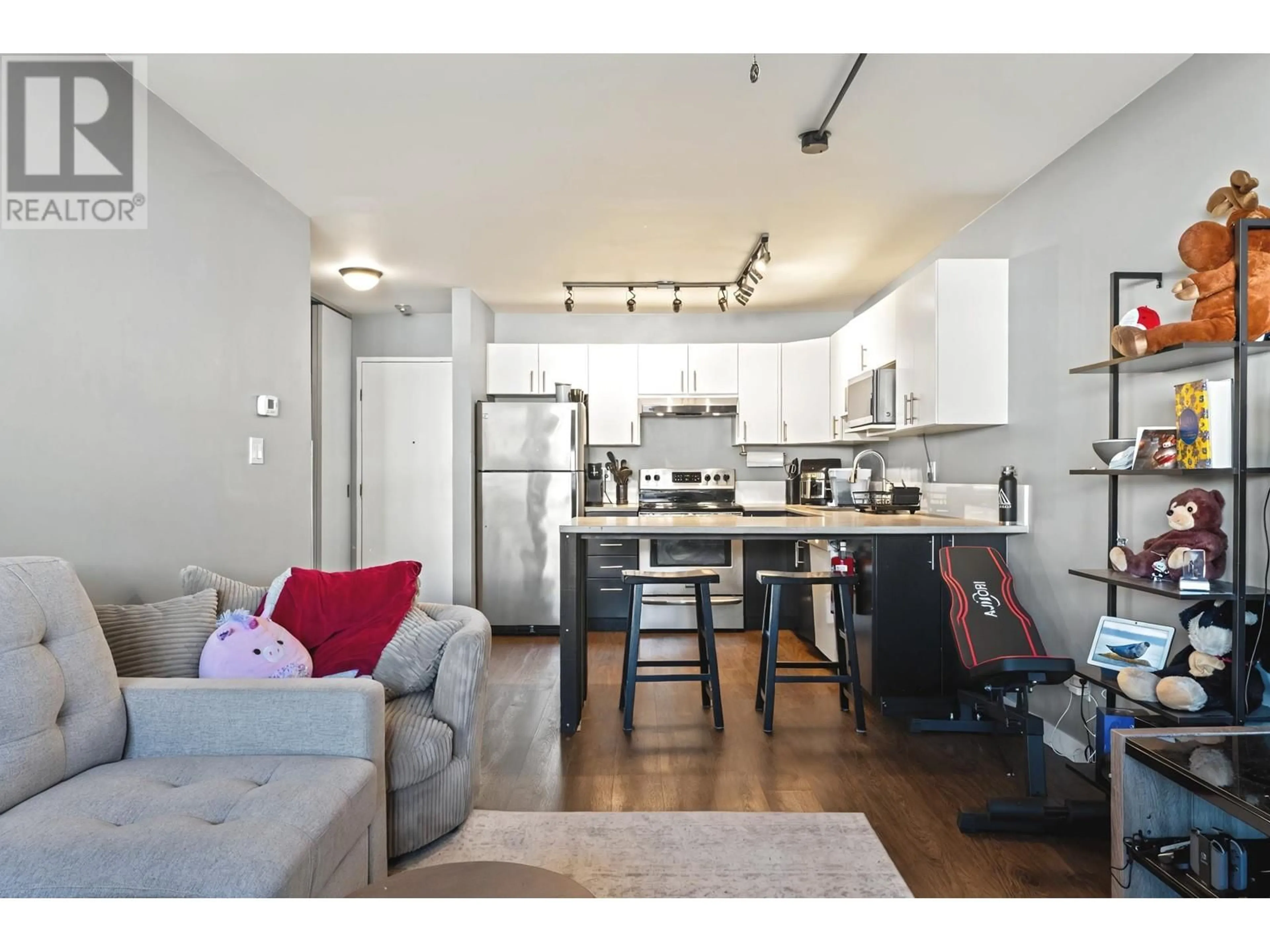 Open concept kitchen, wood/laminate floor for 301 - 1209 HOWIE AVENUE, Coquitlam British Columbia V3J1T9