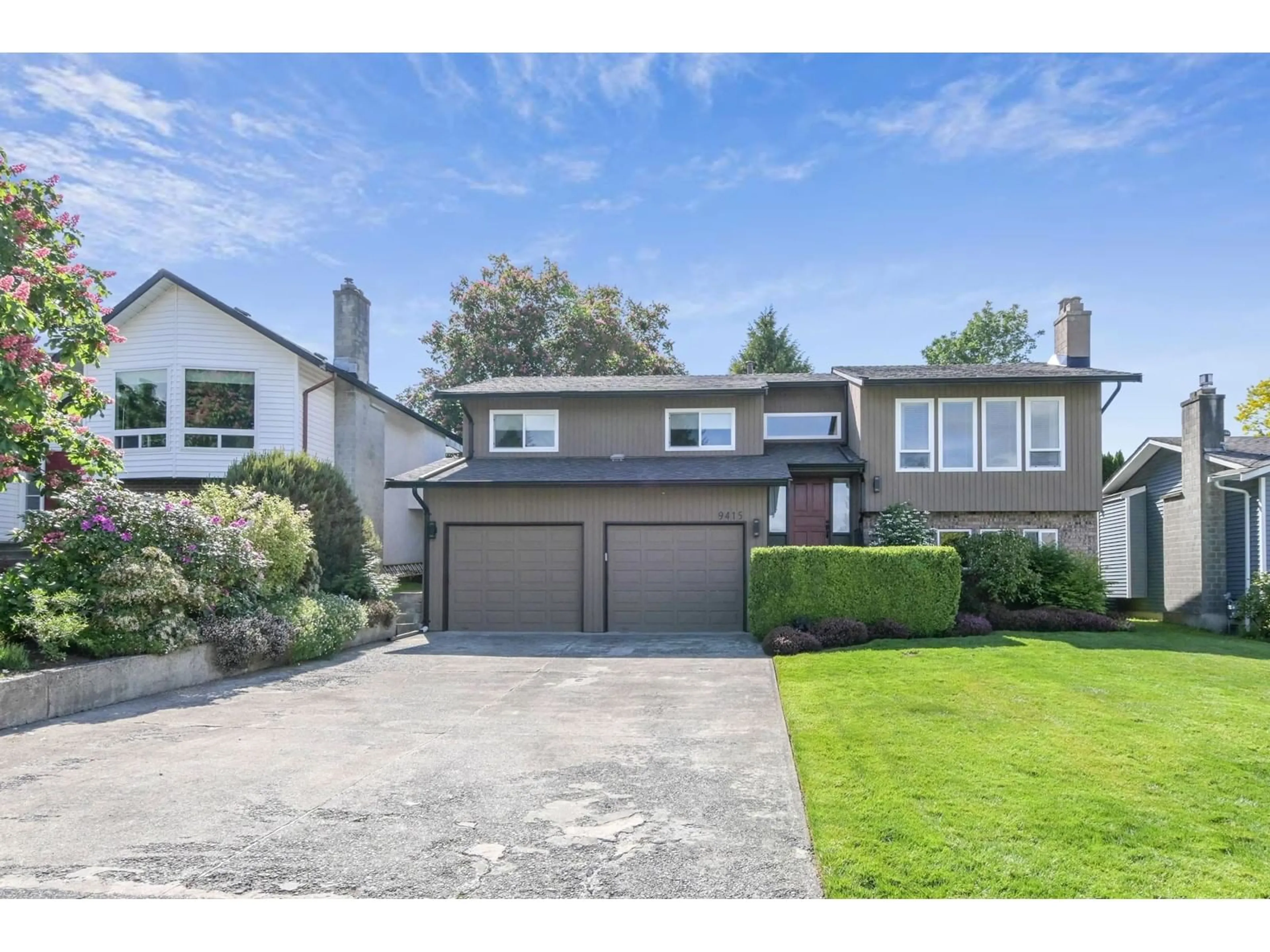 Home with vinyl exterior material, street for 9415 212B, Langley British Columbia V1M1M5