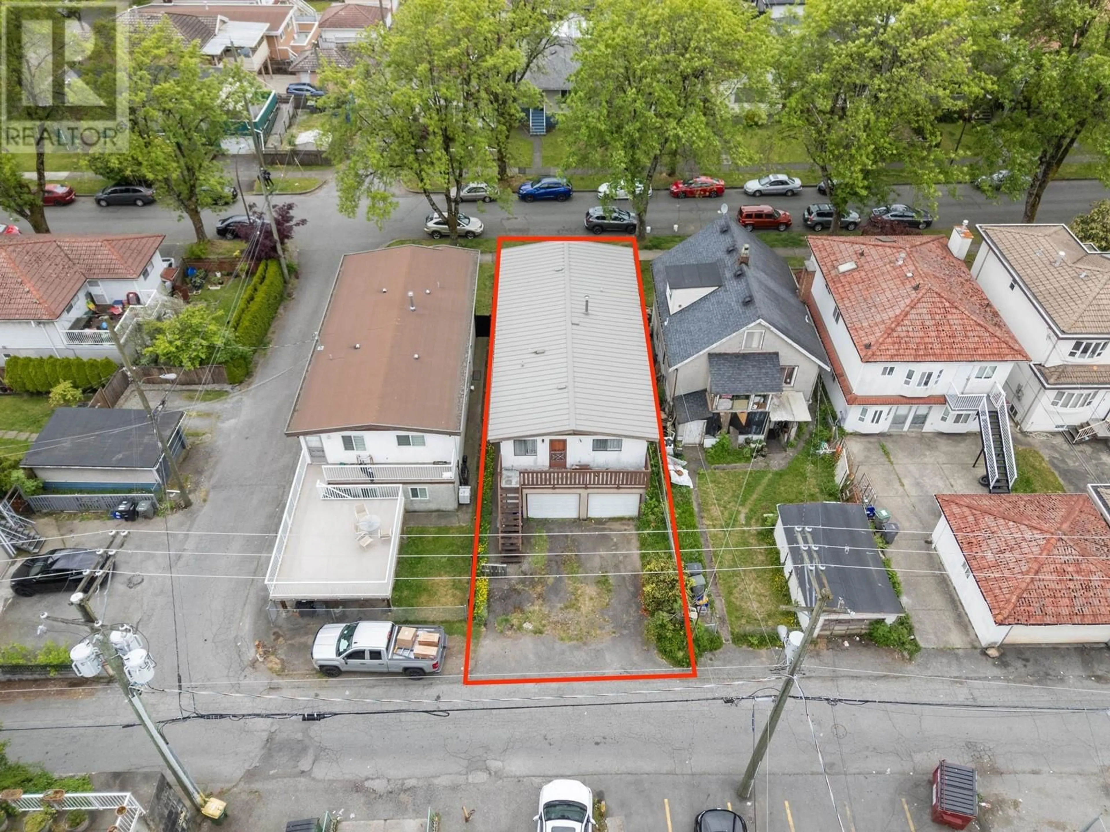 A pic from outside/outdoor area/front of a property/back of a property/a pic from drone, street for 6966 BEATRICE STREET, Vancouver British Columbia V5P3R7