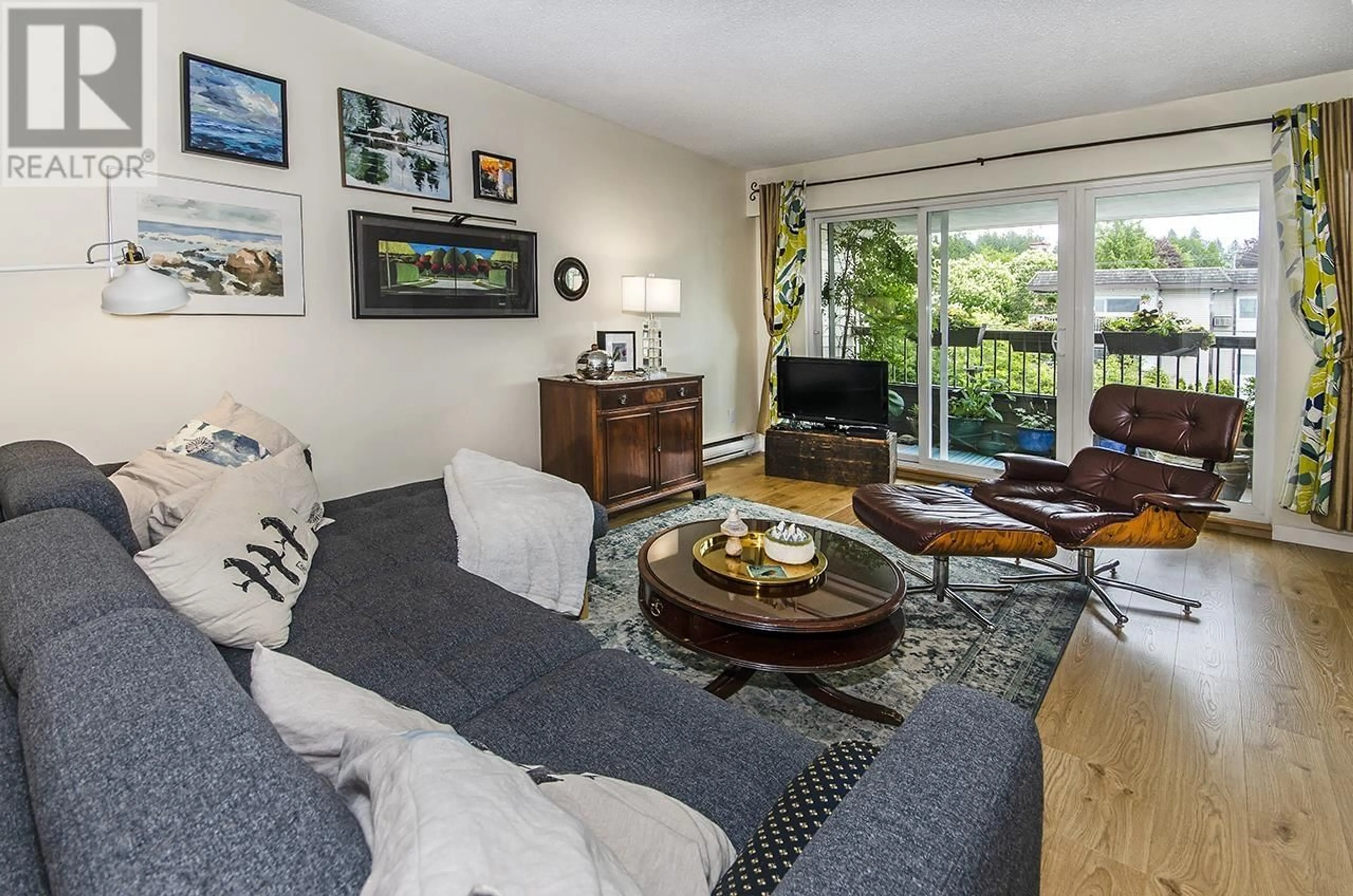Living room with furniture, unknown for 202 - 105 KINGS ROAD, North Vancouver British Columbia V7N2L7