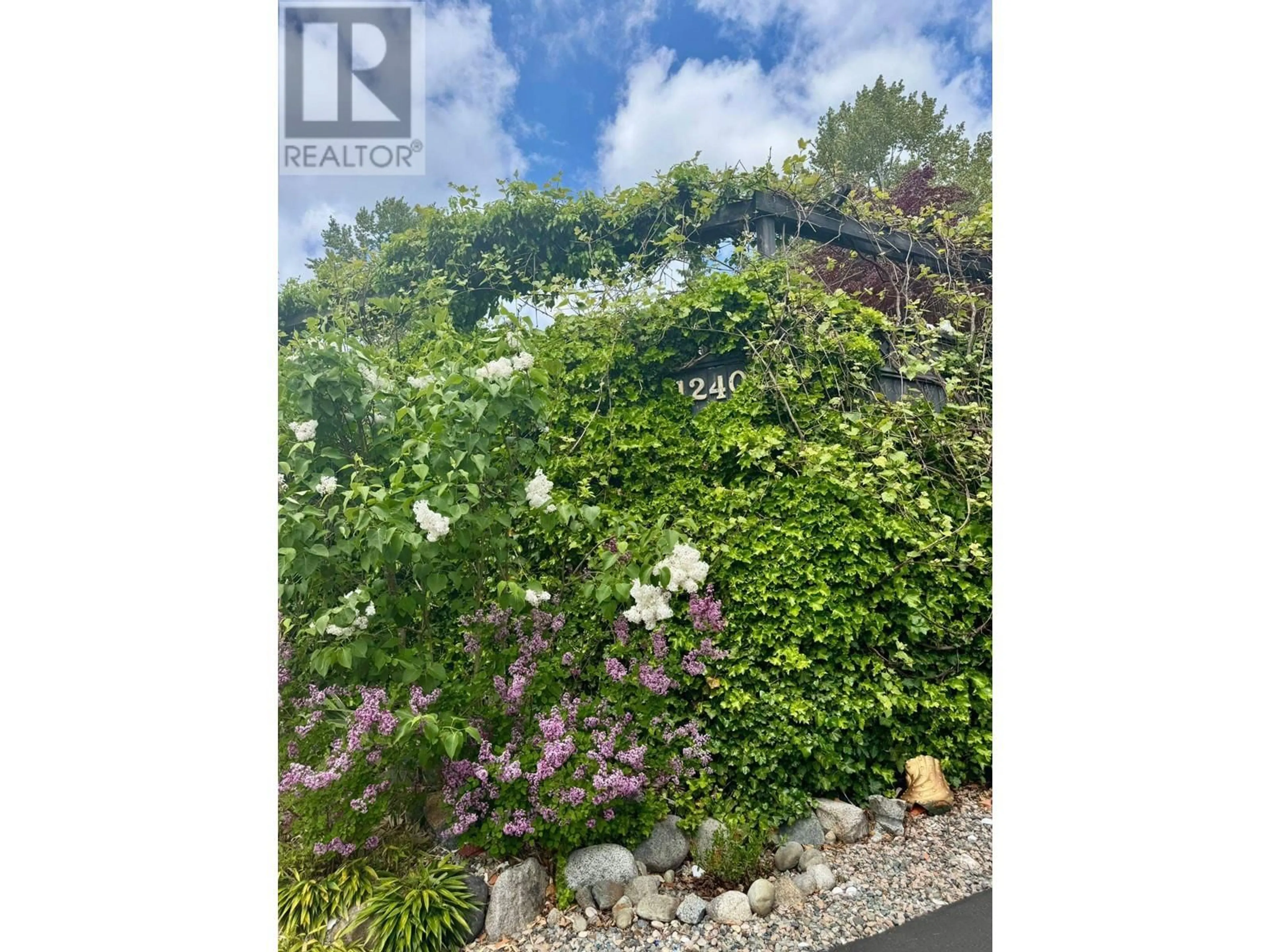 A pic from outside/outdoor area/front of a property/back of a property/a pic from drone, street for 1240 EASTVIEW ROAD, North Vancouver British Columbia V7J1L6