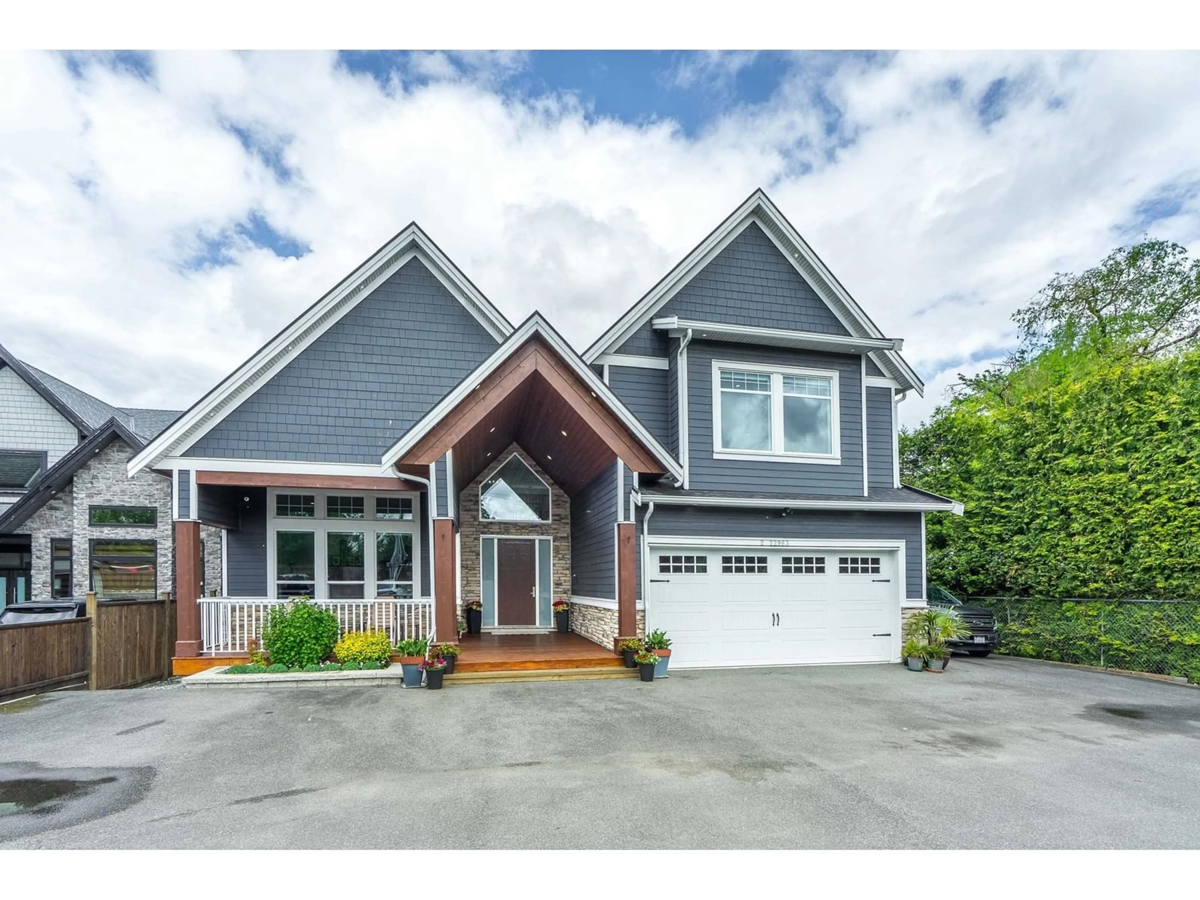 Home with vinyl exterior material, street for 2 - 22963 FRASER, Langley British Columbia V2Z2T3