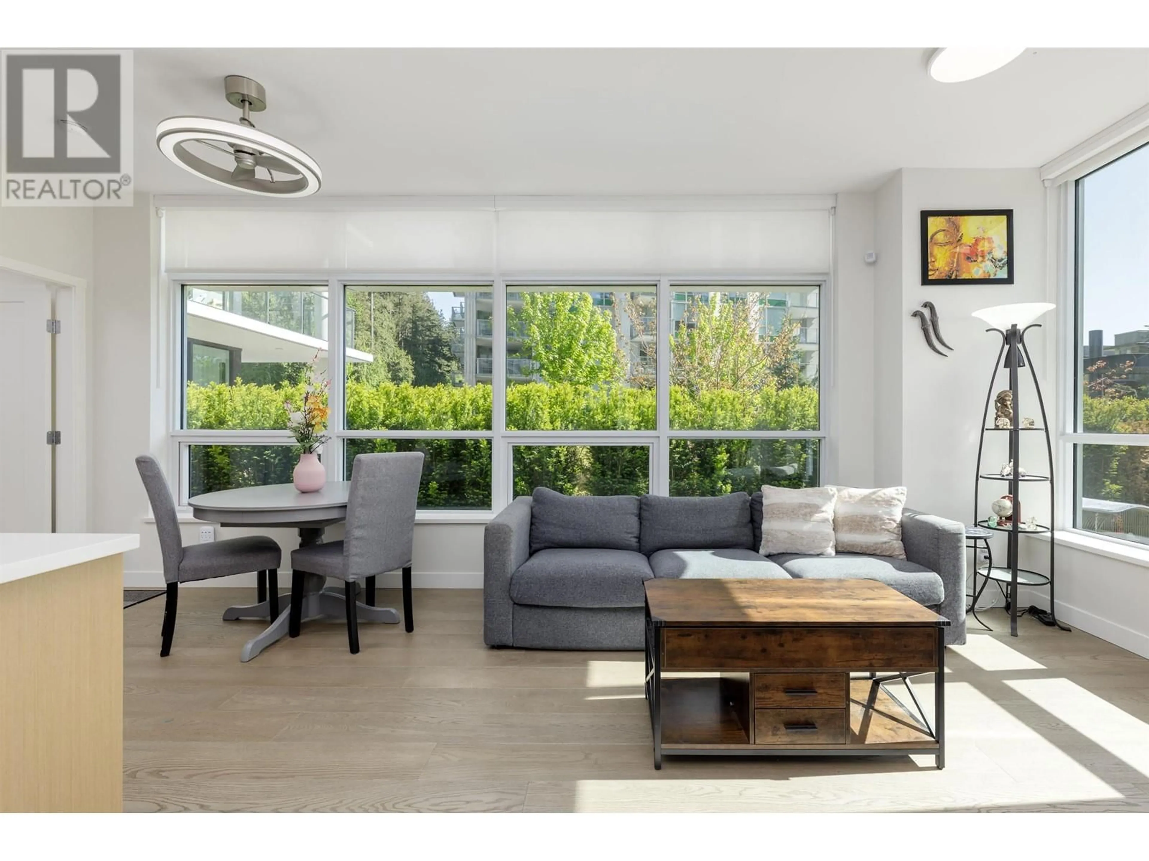 Living room with furniture, wood/laminate floor for 107 - 5608 BERTON AVENUE, University Endowment Lands British Columbia V6S0M6