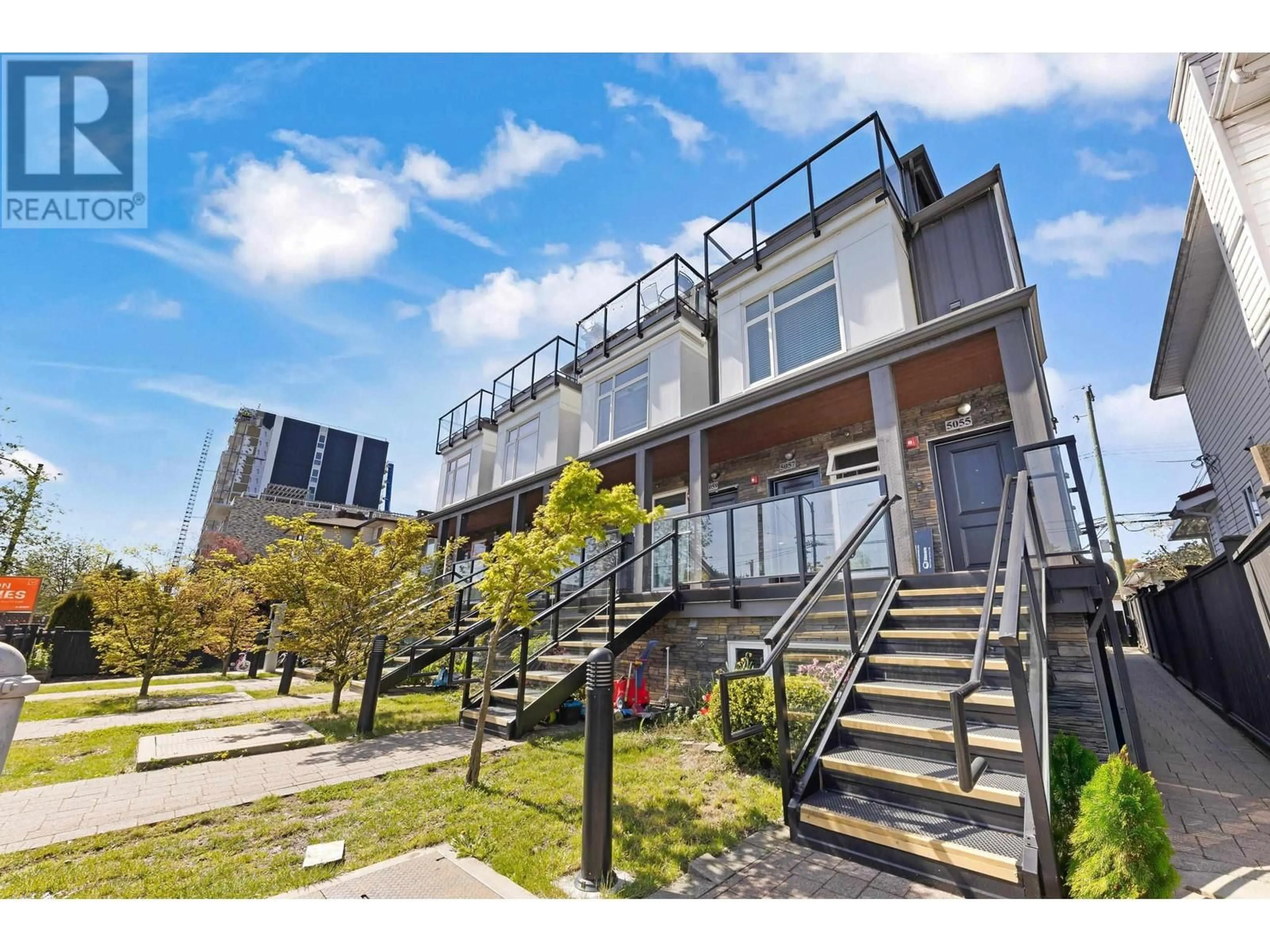 A pic from outside/outdoor area/front of a property/back of a property/a pic from drone, street for 5055 EARLES STREET, Vancouver British Columbia V5R3R8