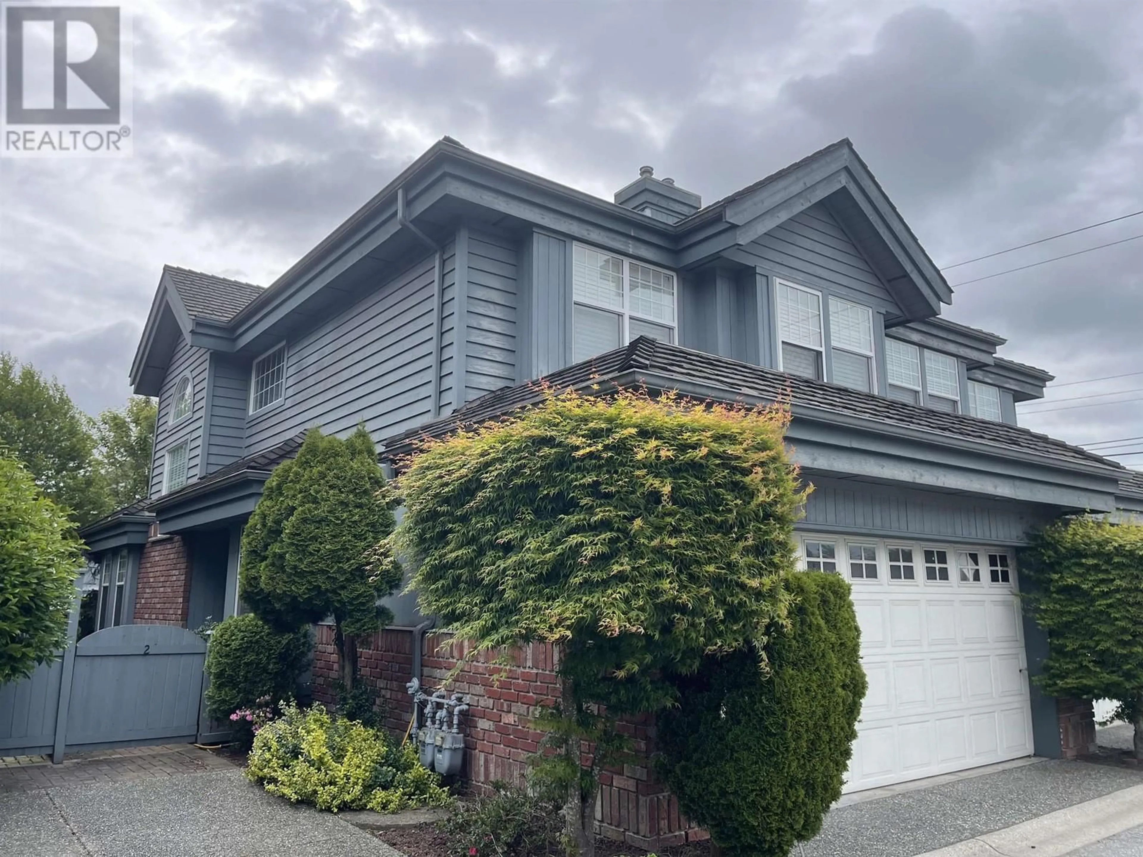 Home with vinyl exterior material, street for 2 - 8171 STEVESTON HIGHWAY, Richmond British Columbia V7A1M4