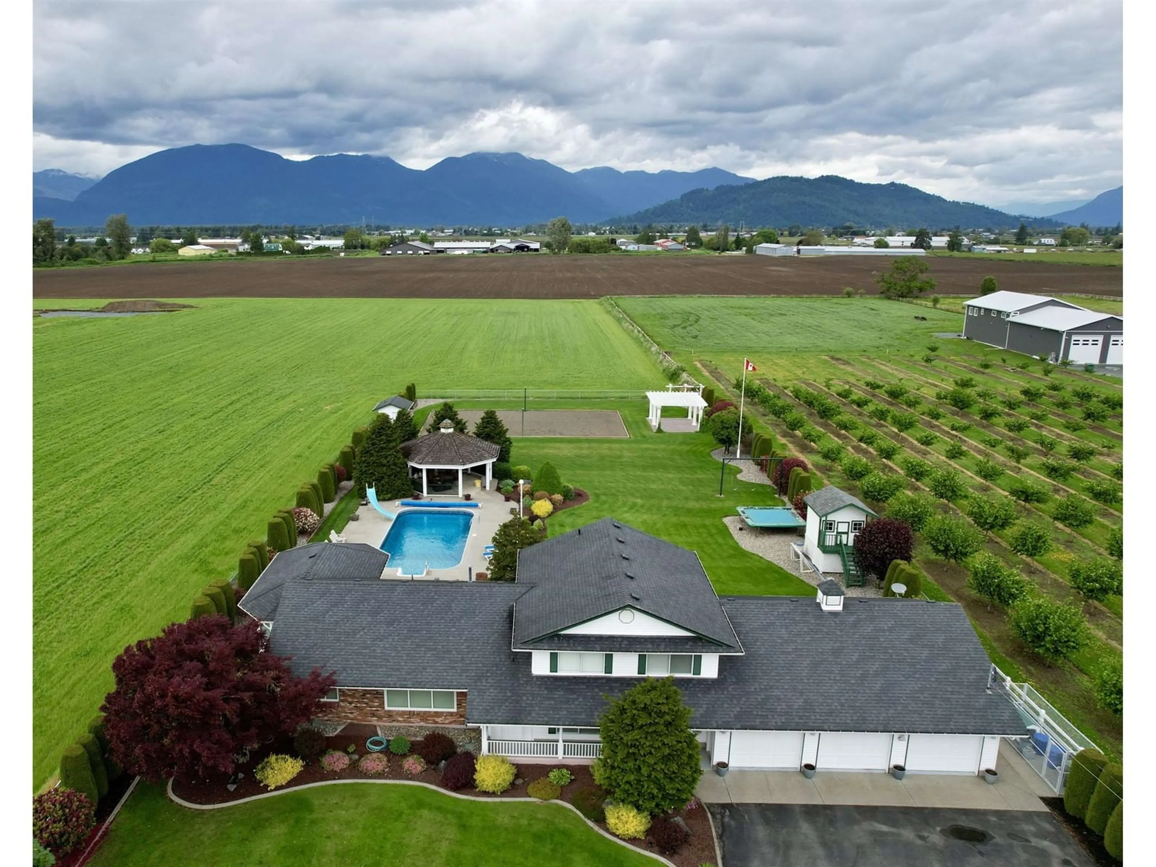 A pic from outside/outdoor area/front of a property/back of a property/a pic from drone, mountain view for 42277 SINCLAIR ROAD, Chilliwack British Columbia V2R4N8