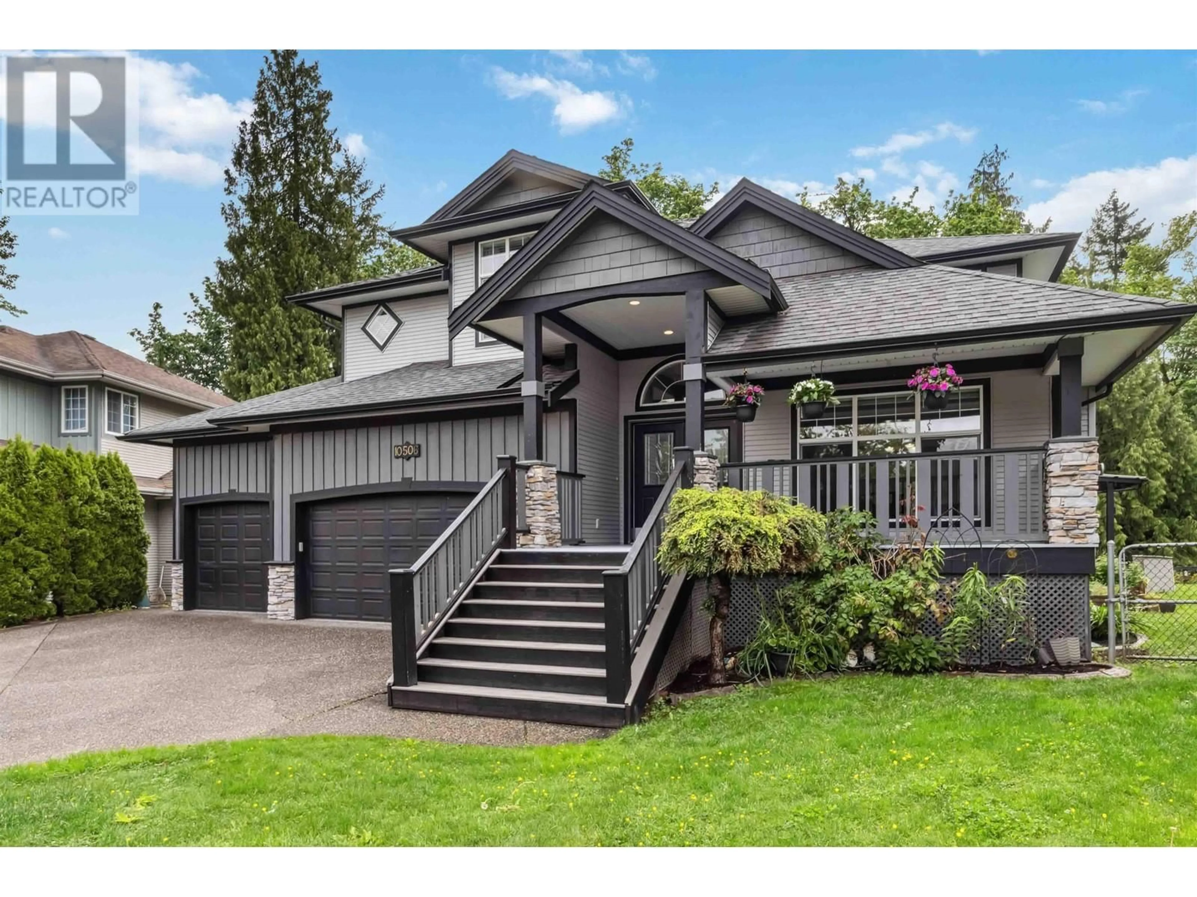 Home with vinyl exterior material, street for 10506 239 STREET, Maple Ridge British Columbia V2W1X1