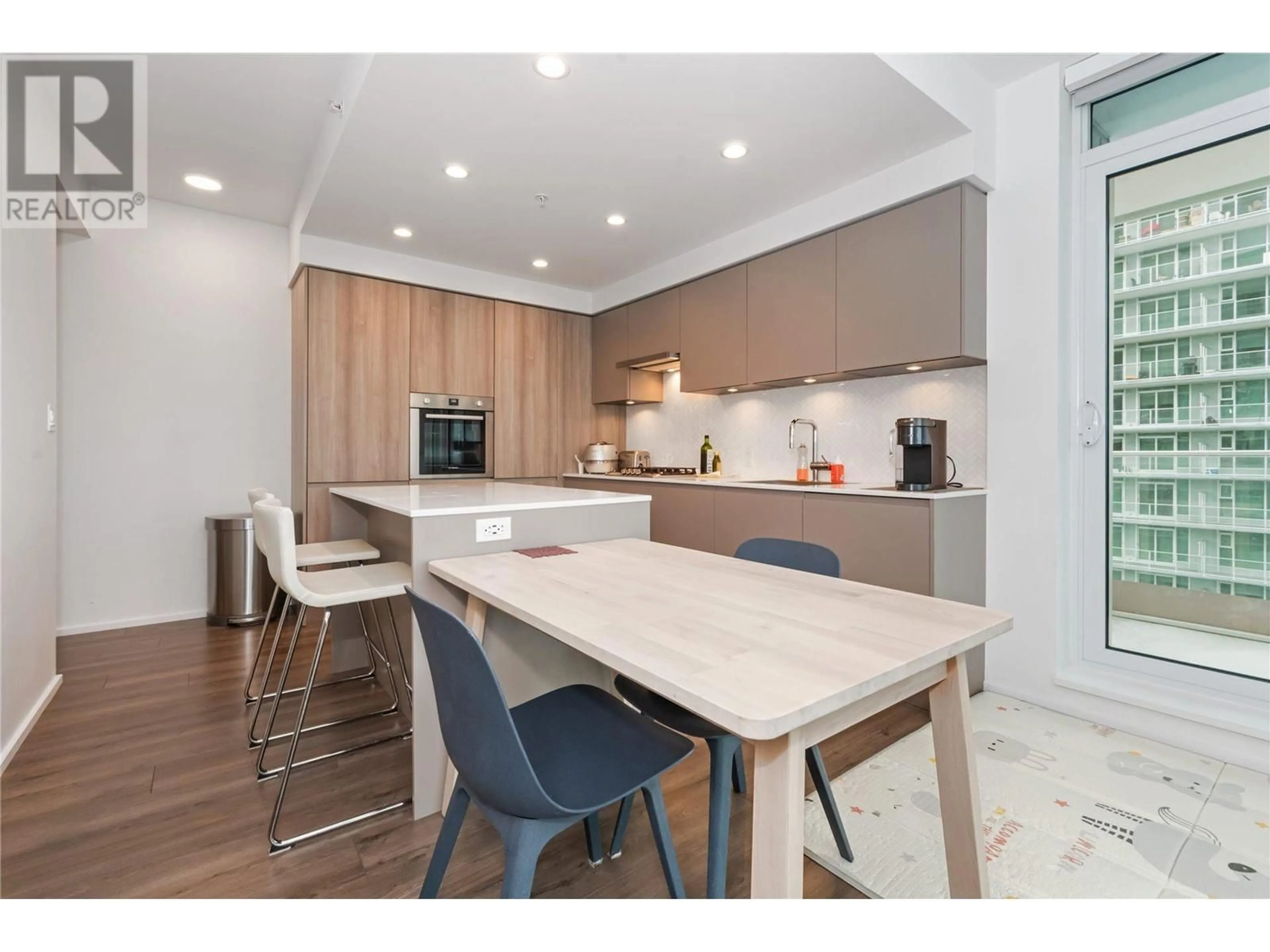 Open concept kitchen, wood/laminate floor for 2801 - 3833 EVERGREEN PLACE, Burnaby British Columbia V3J0M2