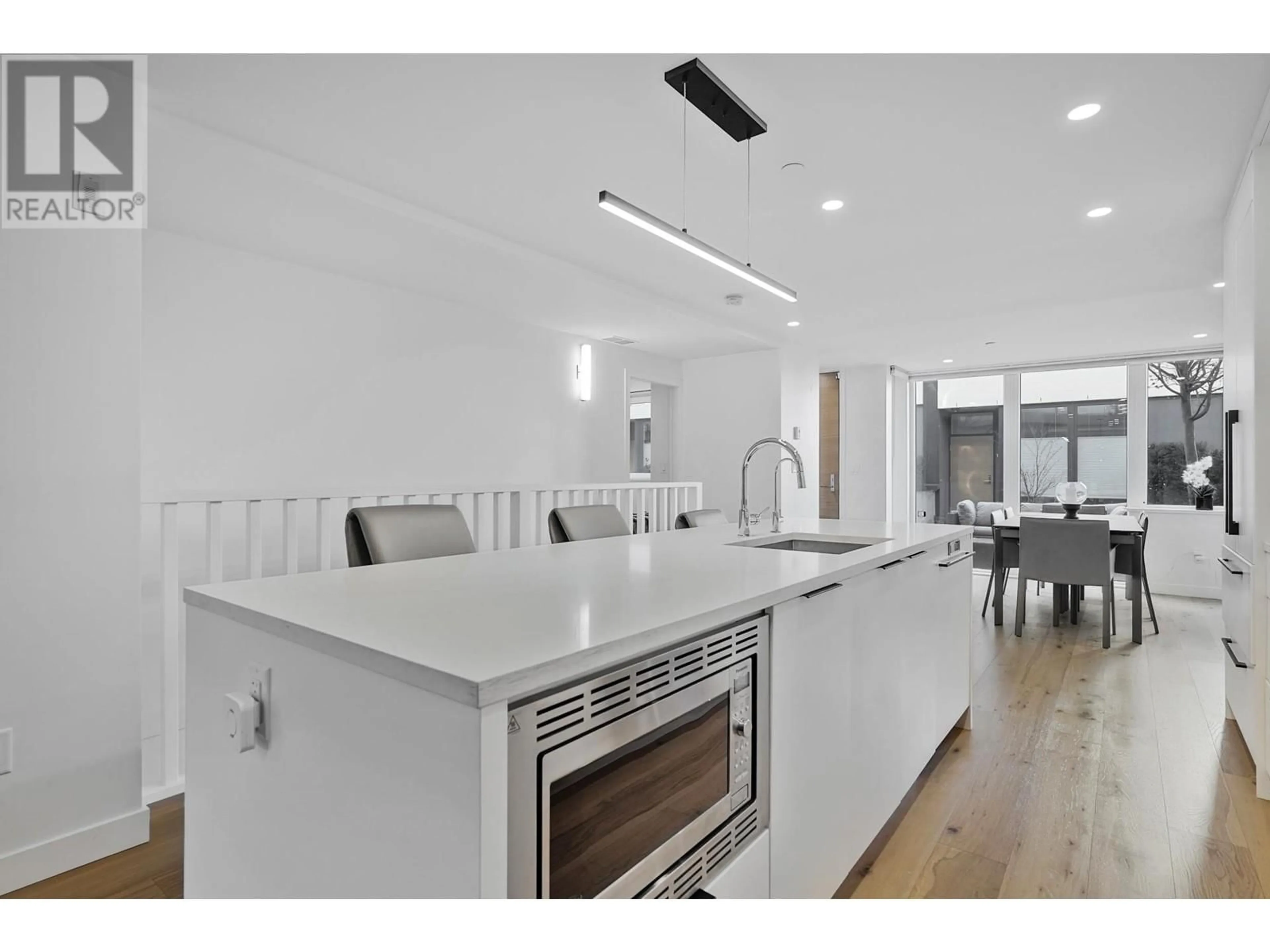 Open concept kitchen, unknown for 101 - 649 3RD STREET, North Vancouver British Columbia V7L1G6