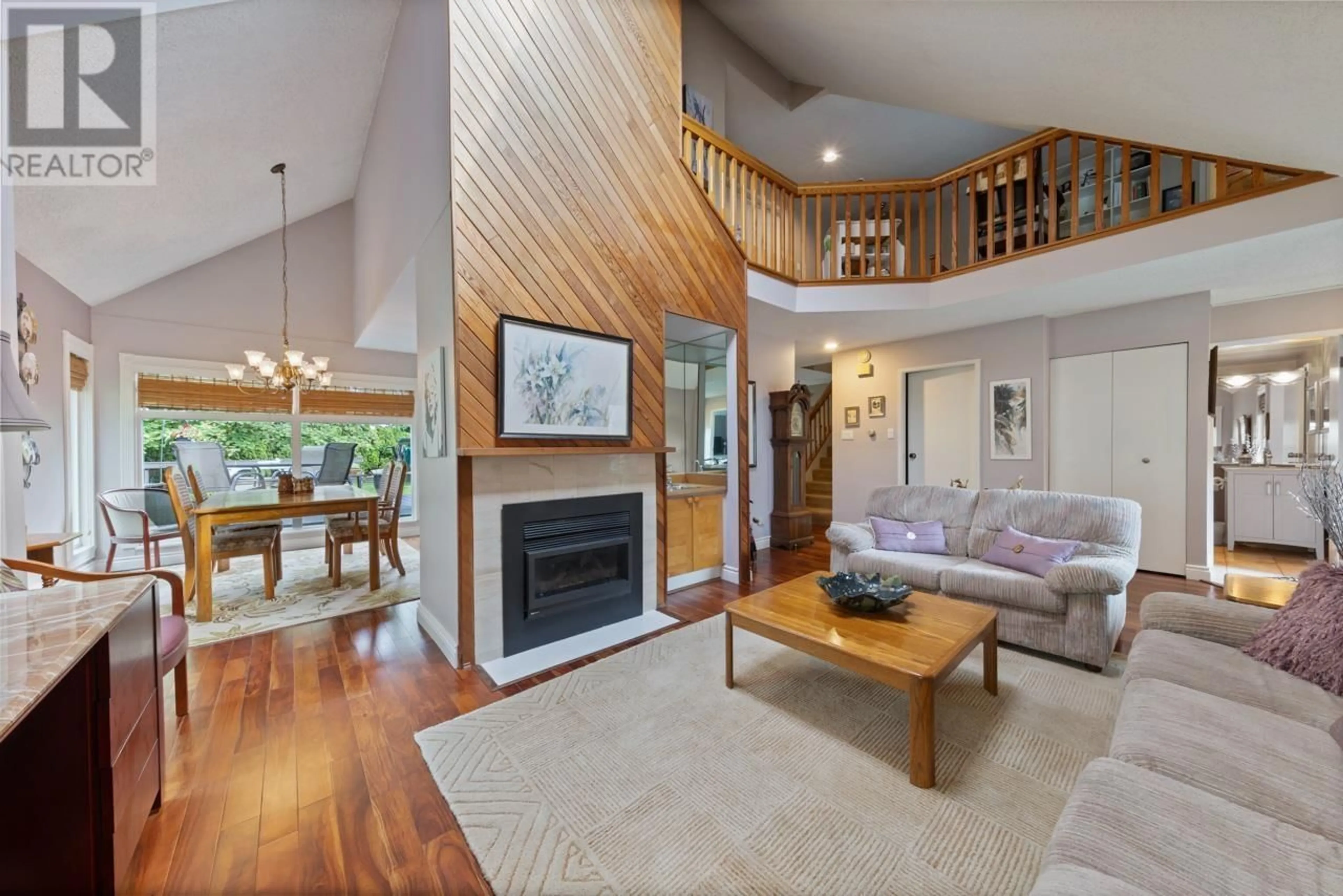 Living room with furniture, wood/laminate floor for 3673 BORHAM CRESCENT, Vancouver British Columbia V5S3X2