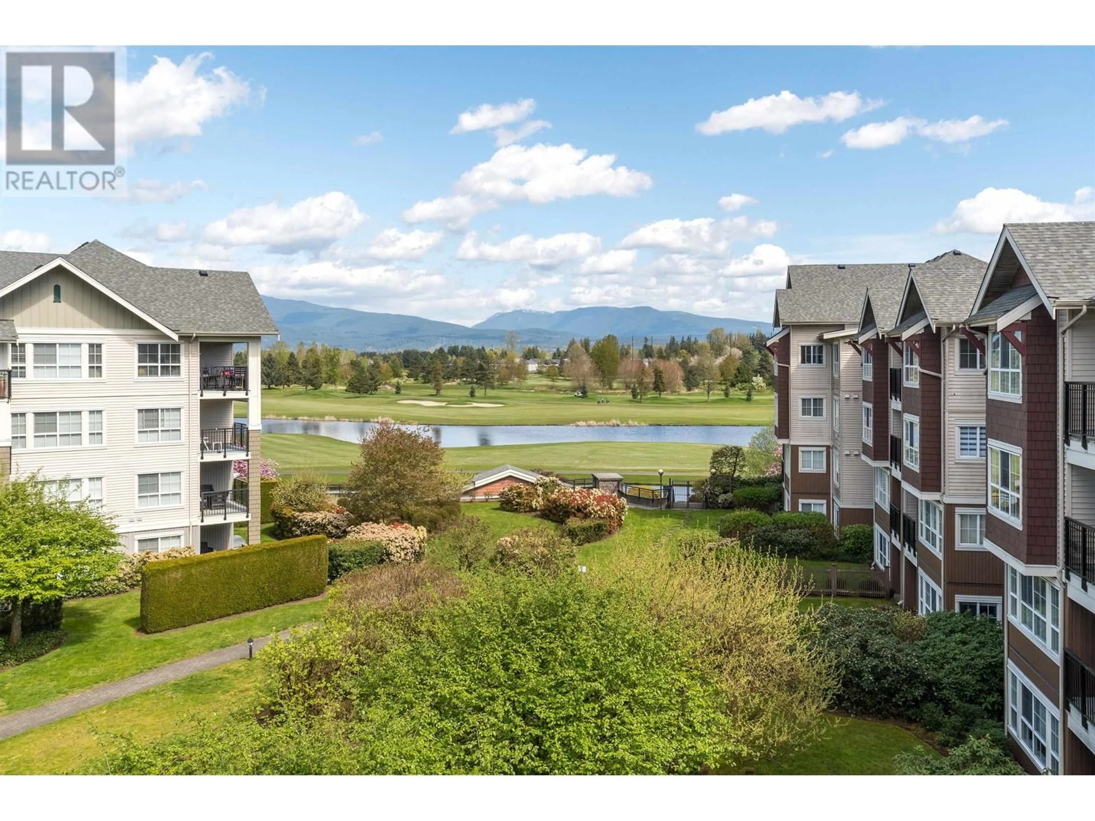 A pic from outside/outdoor area/front of a property/back of a property/a pic from drone, water/lake/river/ocean view for 423 - 19677 MEADOW GARDENS WAY, Pitt Meadows British Columbia V3Y0A2