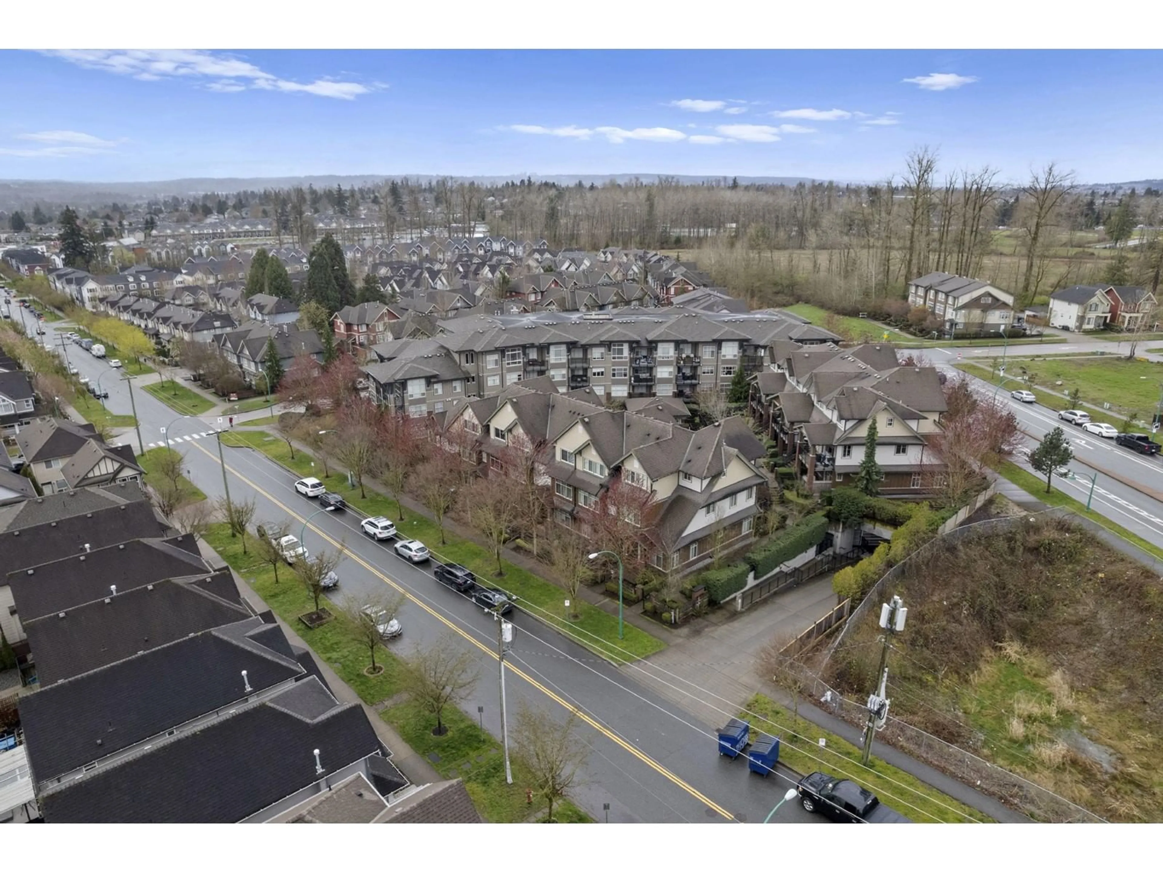 A pic from outside/outdoor area/front of a property/back of a property/a pic from drone, mountain view for 208 - 6655 192, Surrey British Columbia V4N0B9