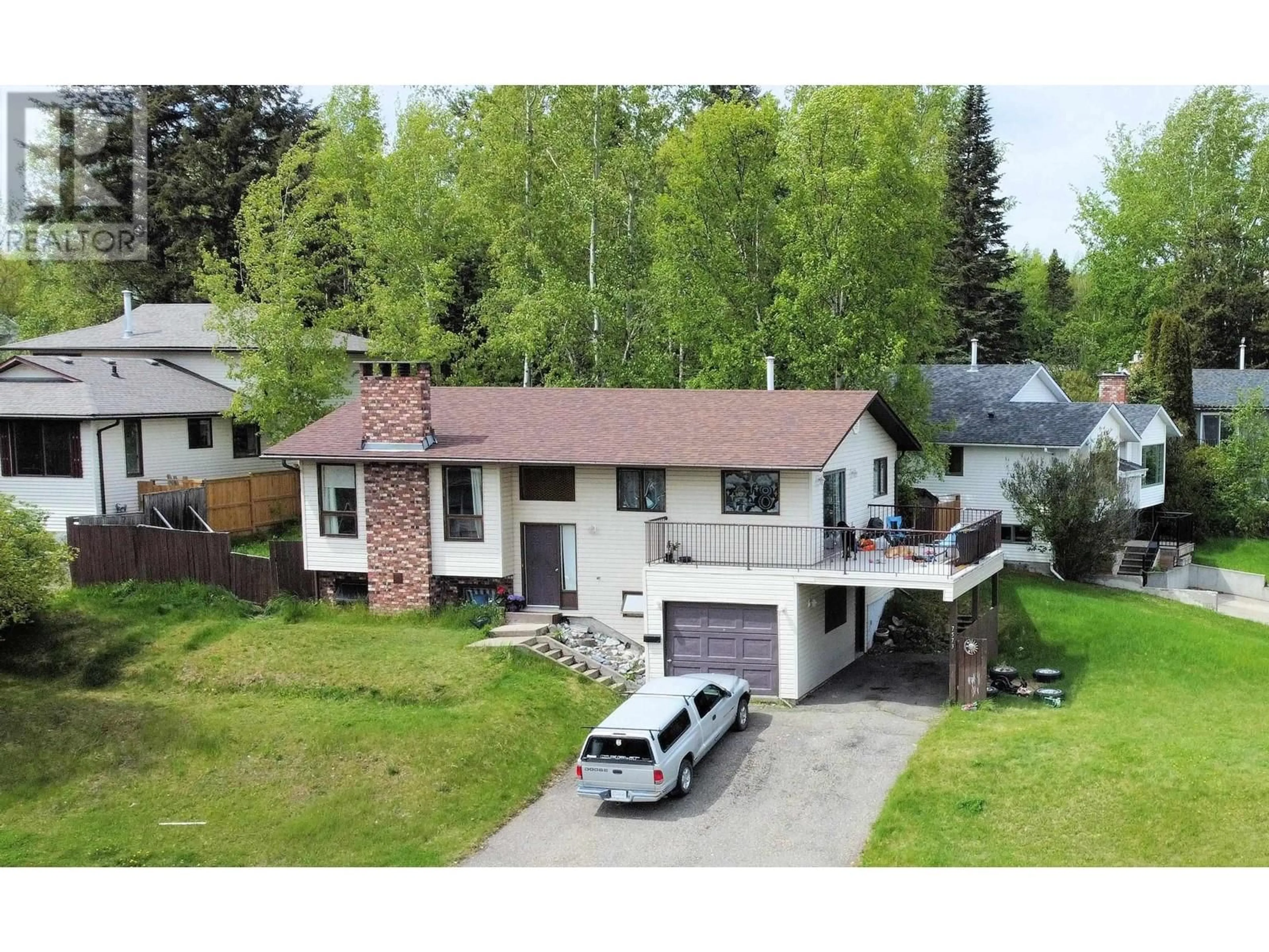A pic from outside/outdoor area/front of a property/back of a property/a pic from drone, street for 7573 ST PATRICK AVENUE, Prince George British Columbia V2N4C7