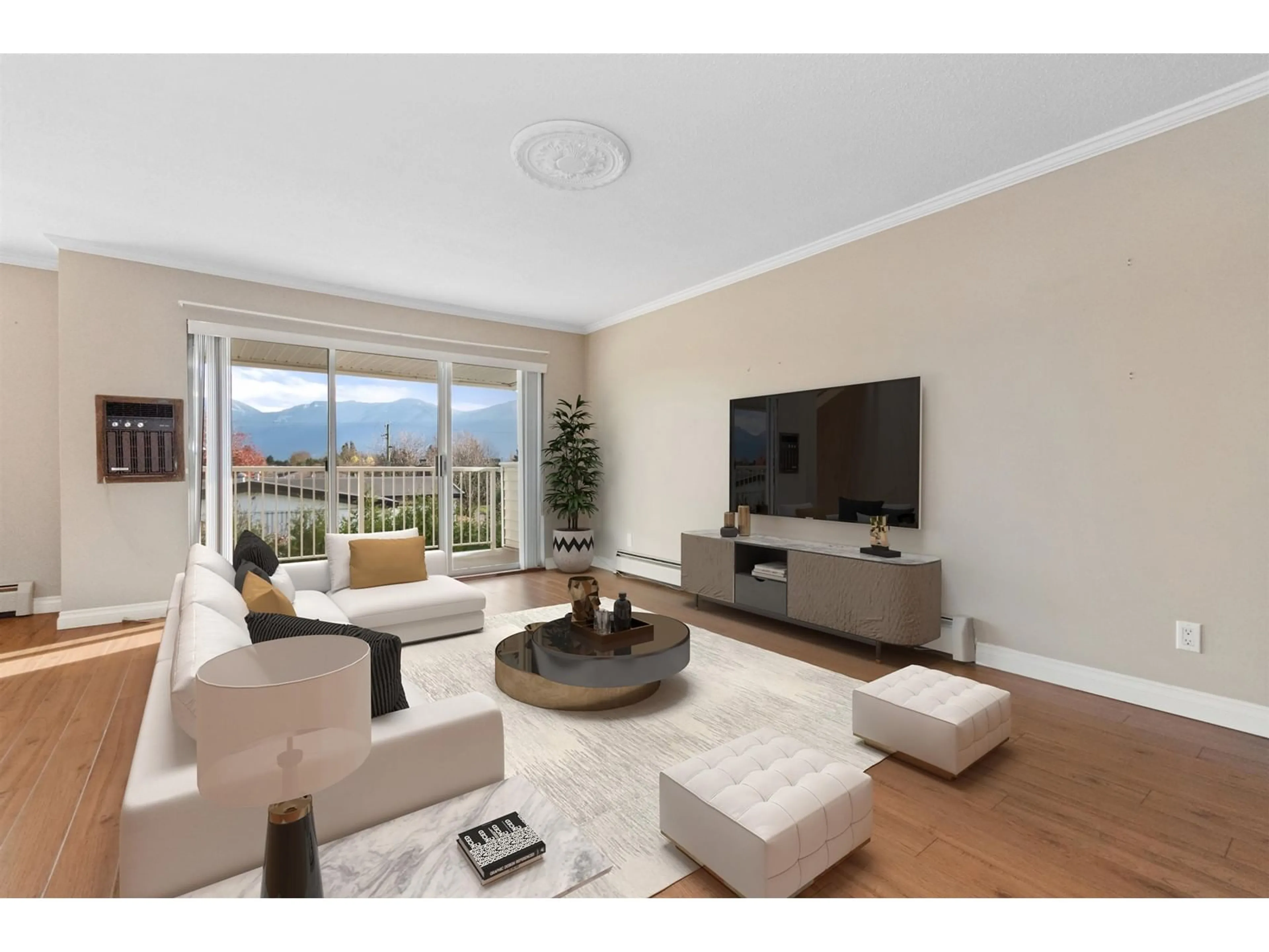 Living room with furniture, wood/laminate floor for 214 - 8725 ELM DRIVE, Chilliwack British Columbia V2P4Y3