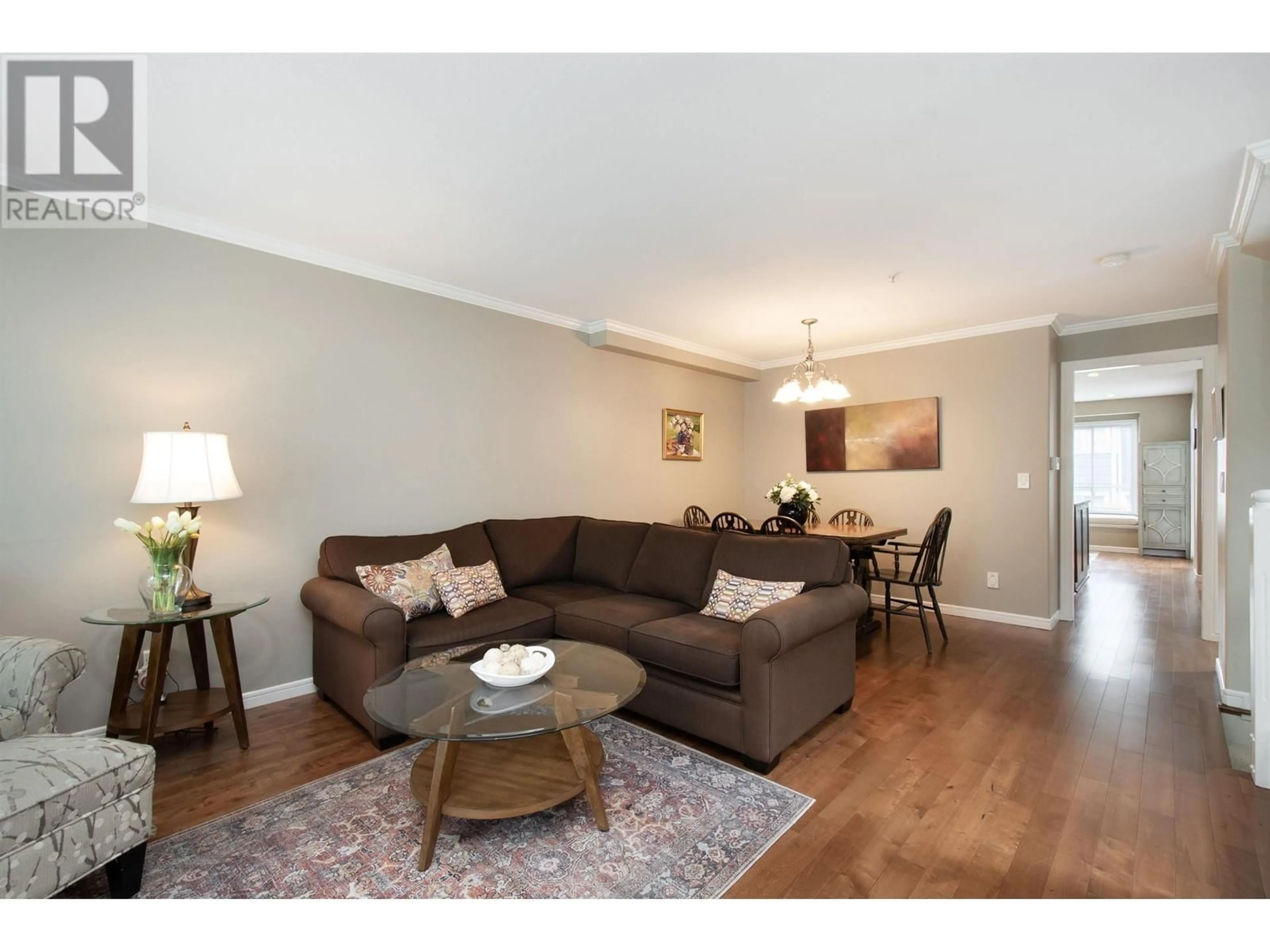 Living room with furniture, wood/laminate floor for 279 5TH STREET, North Vancouver British Columbia V7L1L8