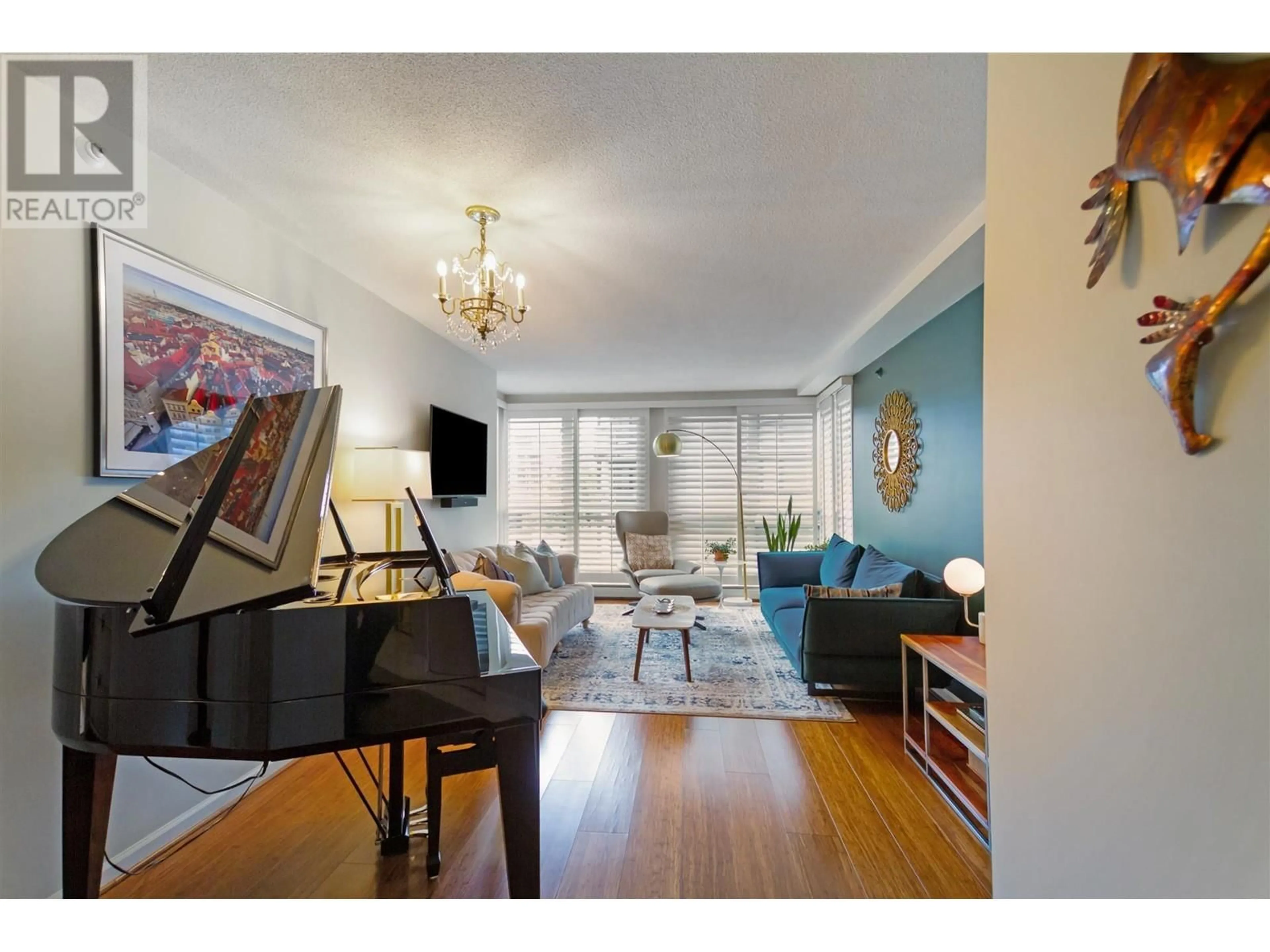 Living room with furniture, wood/laminate floor for 3F - 199 DRAKE STREET, Vancouver British Columbia V6Z2T9