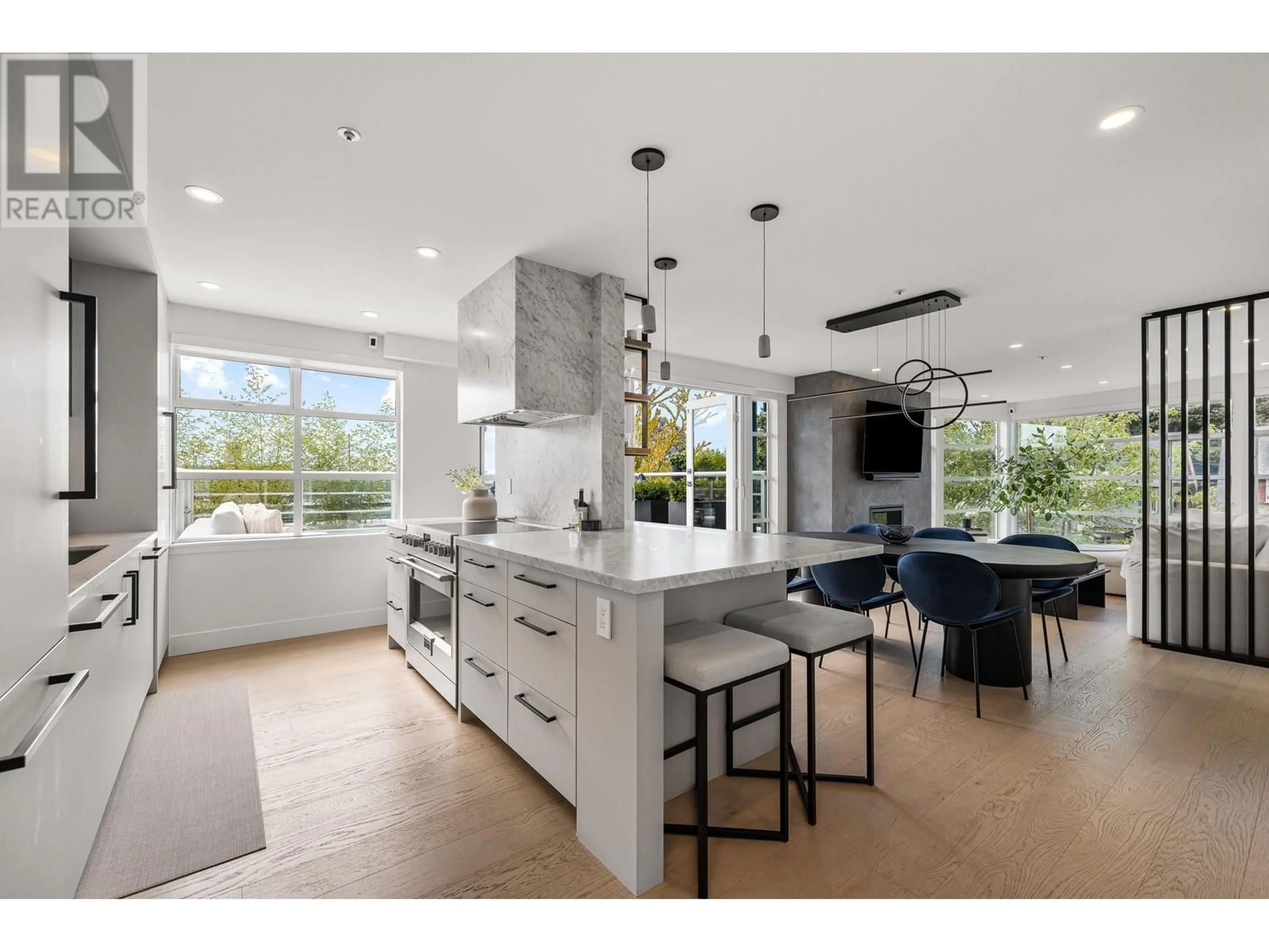Open concept kitchen, ceramic/tile floor for PH 403 - 2525 4 AVENUE, Vancouver British Columbia V6K1P5