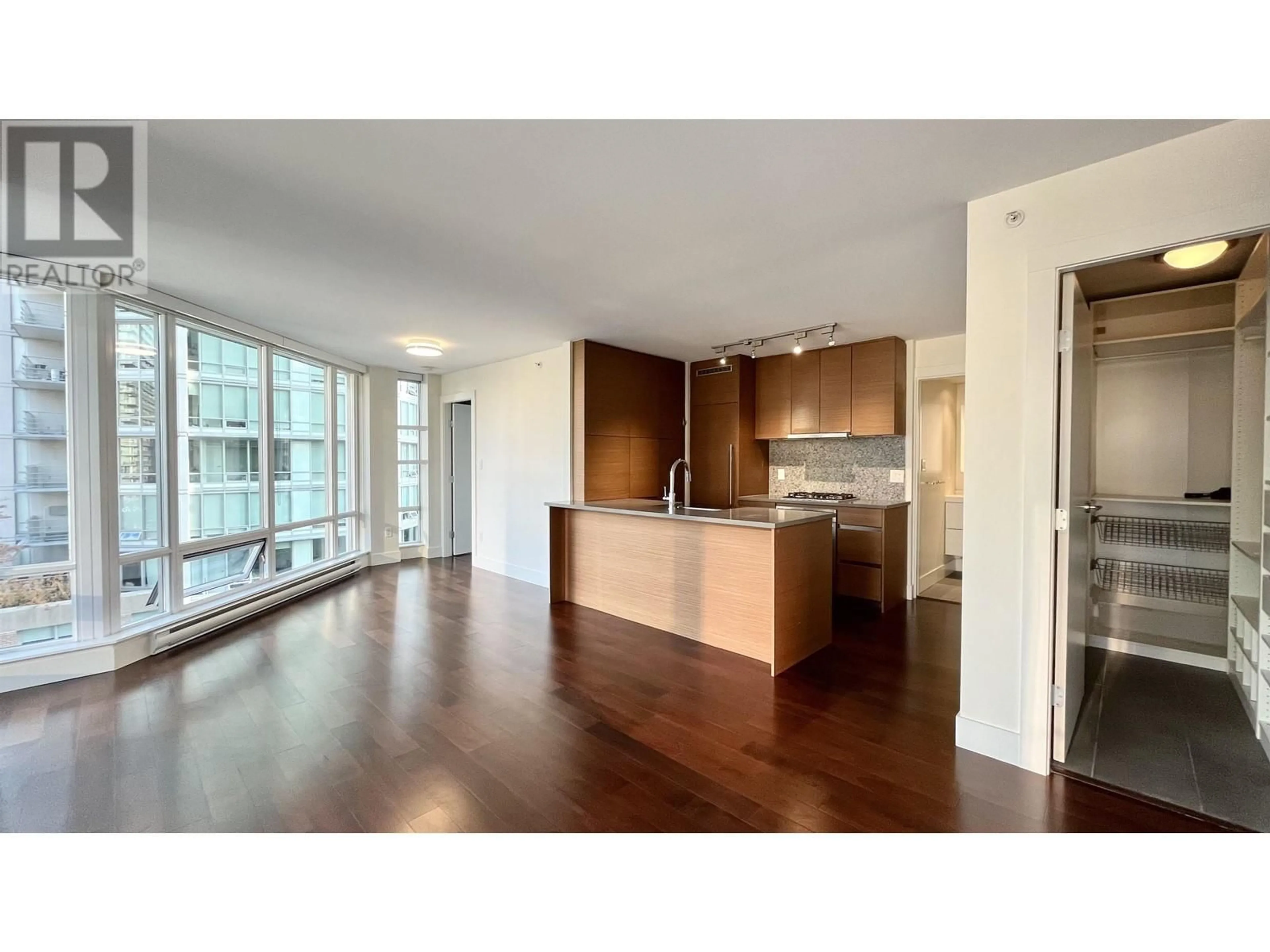 Open concept kitchen, wood/laminate floor for 1107 - 565 SMITHE STREET, Vancouver British Columbia V6B0E4