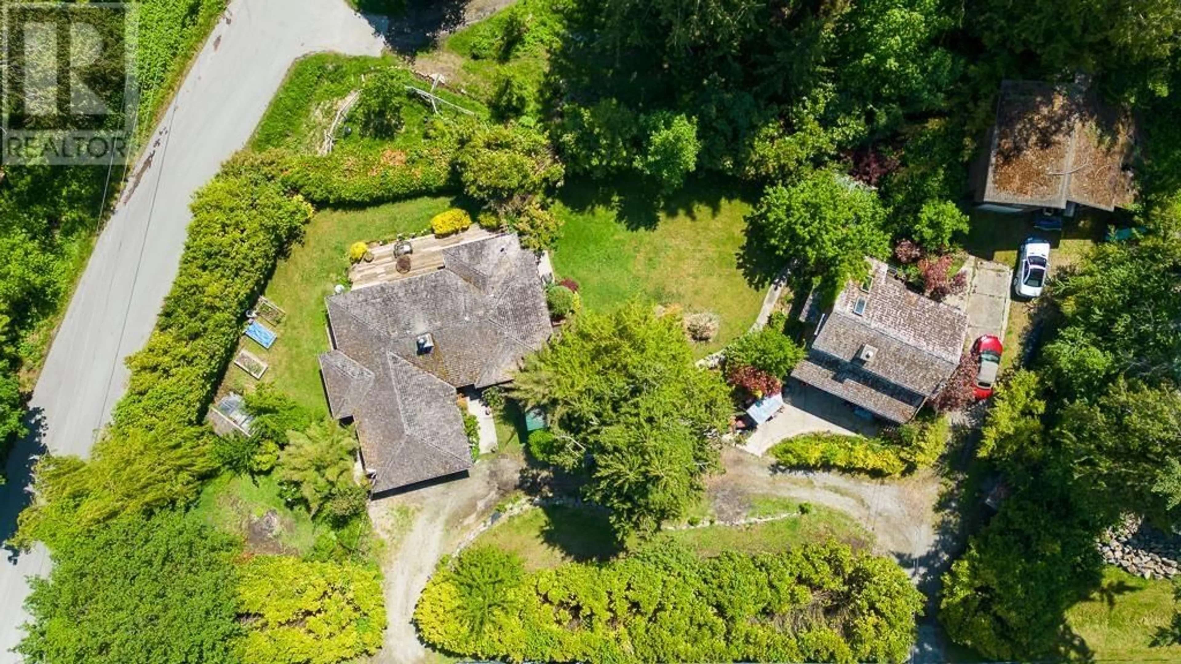A pic from outside/outdoor area/front of a property/back of a property/a pic from drone, street for 4684 COCHRANE ROAD, Pender Harbour British Columbia V0N2H1