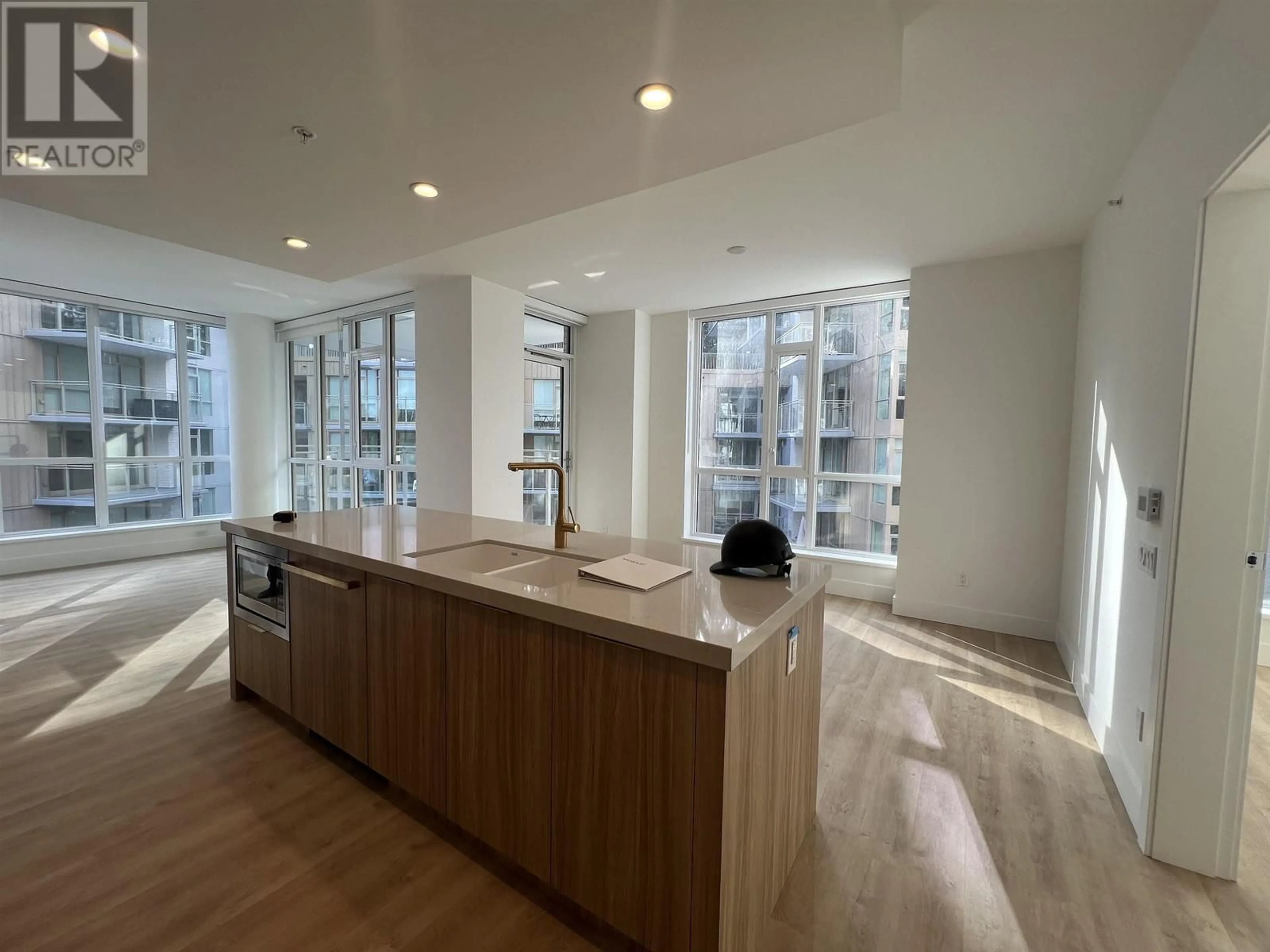 Open concept kitchen, unknown for 403 - 2385 EMERY COURT, North Vancouver British Columbia V7J0G1