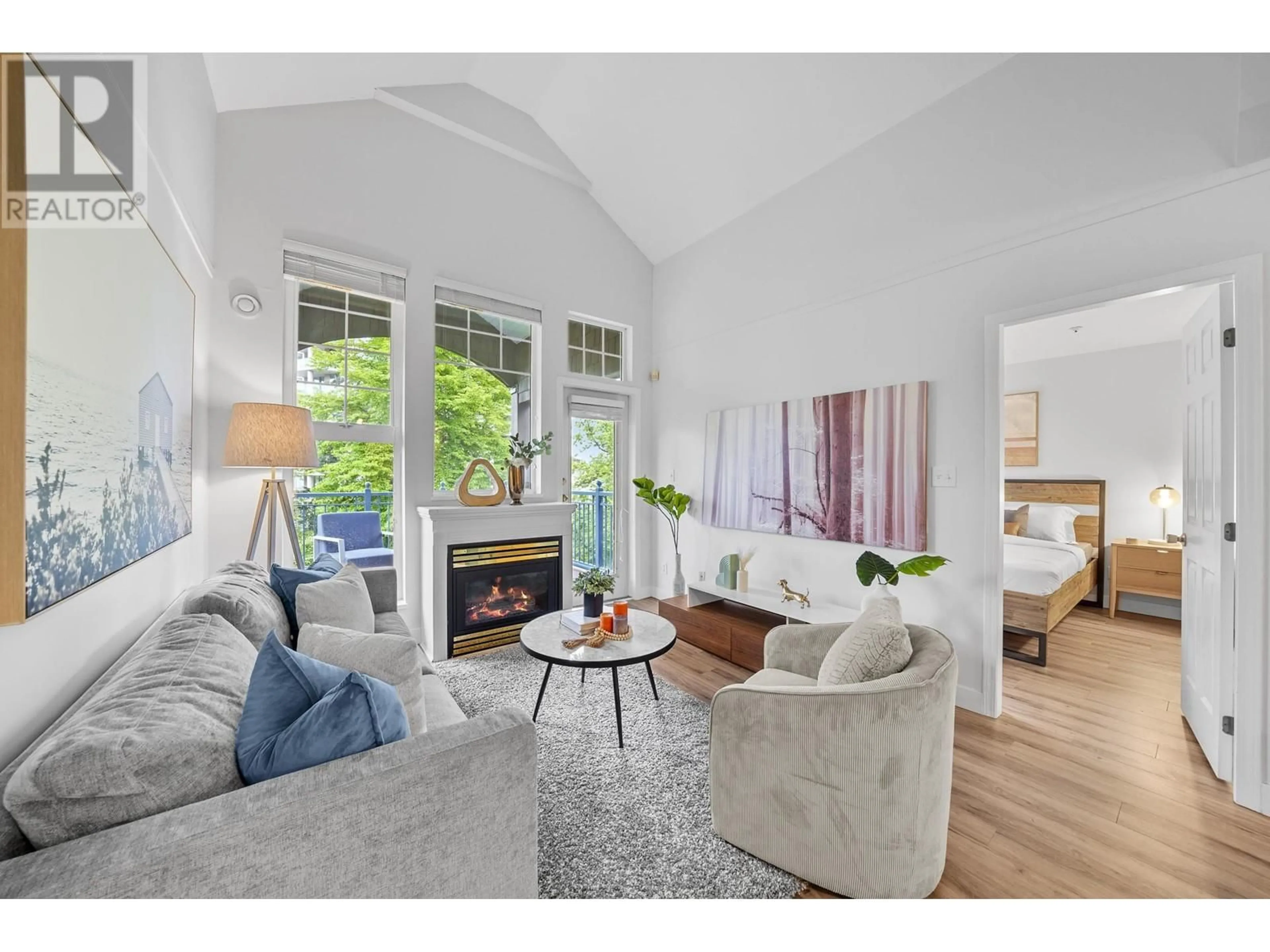 Living room with furniture, wood/laminate floor for 401 - 1190 EASTWOOD STREET, Coquitlam British Columbia V3B7S1