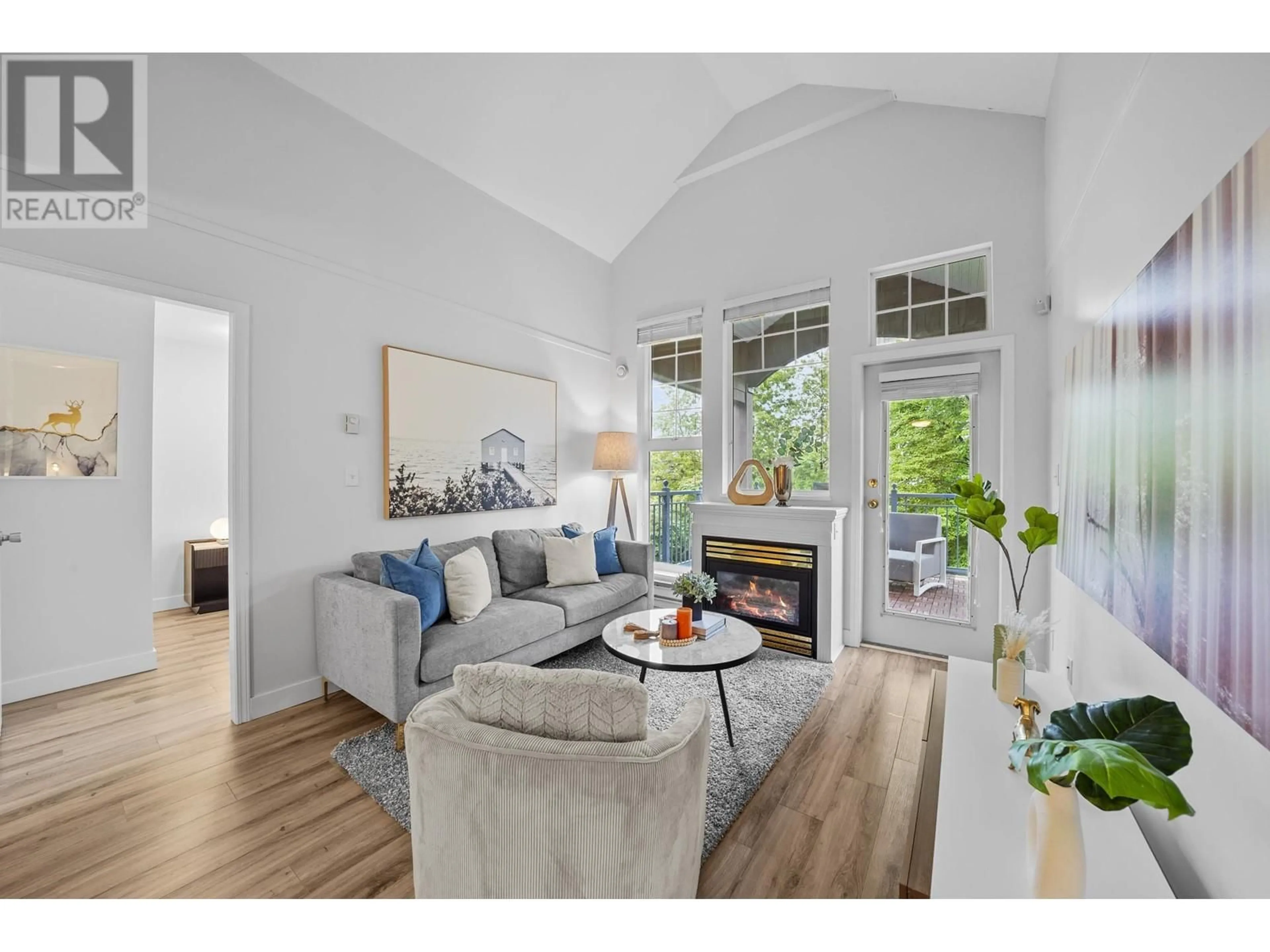 Living room with furniture, wood/laminate floor for 401 - 1190 EASTWOOD STREET, Coquitlam British Columbia V3B7S1