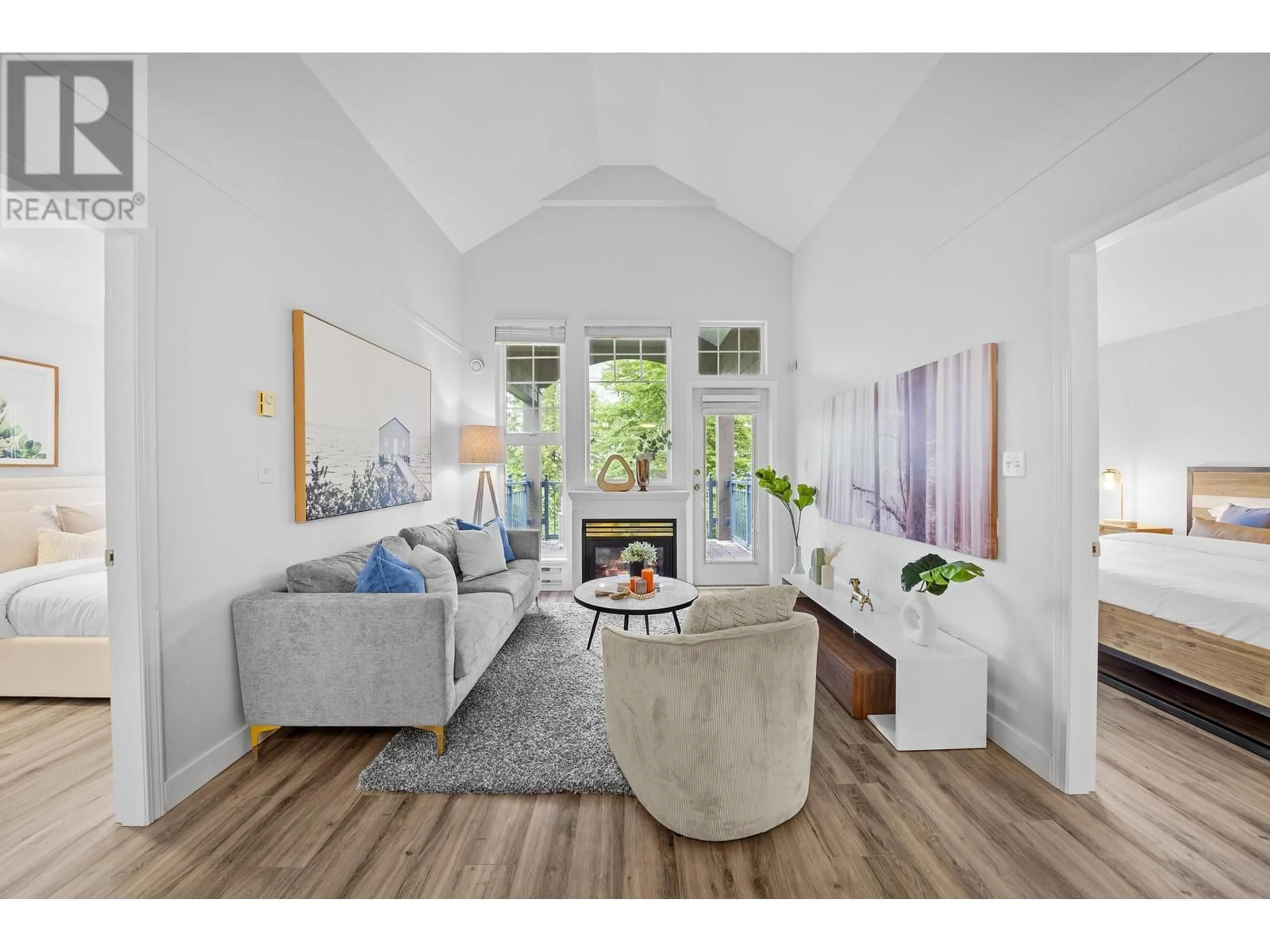 Living room with furniture, wood/laminate floor for 401 - 1190 EASTWOOD STREET, Coquitlam British Columbia V3B7S1