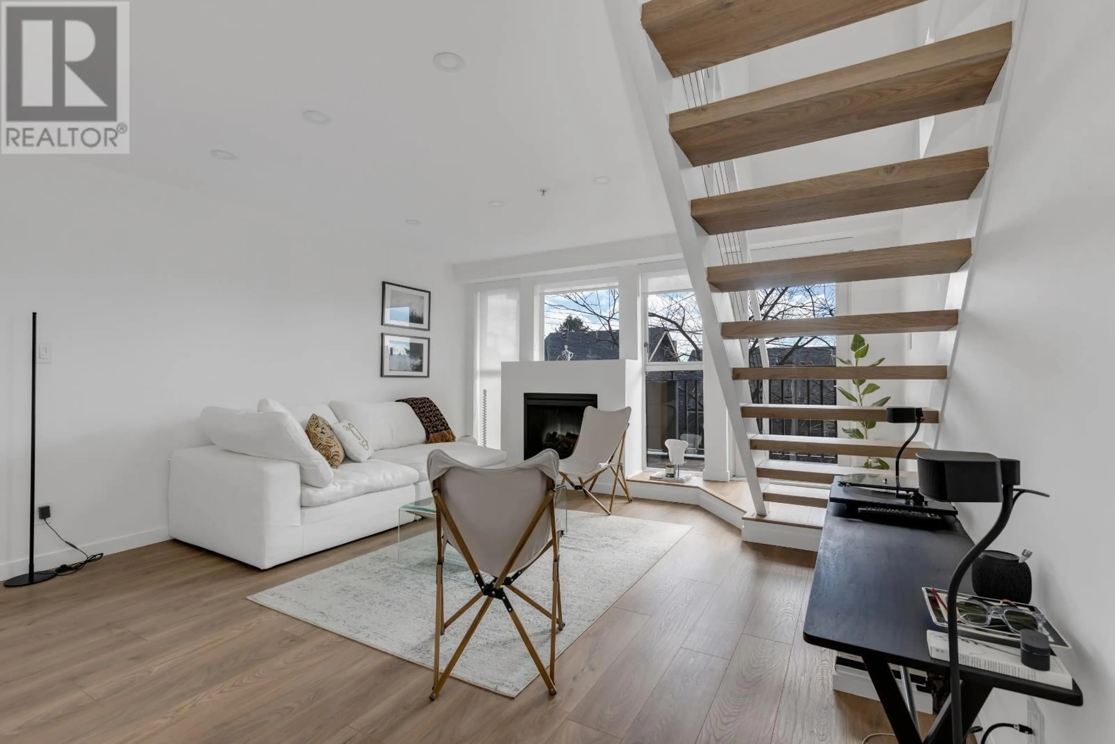Living room with furniture, wood/laminate floor for 301 - 2436 4TH AVENUE, Vancouver British Columbia V6K1P3