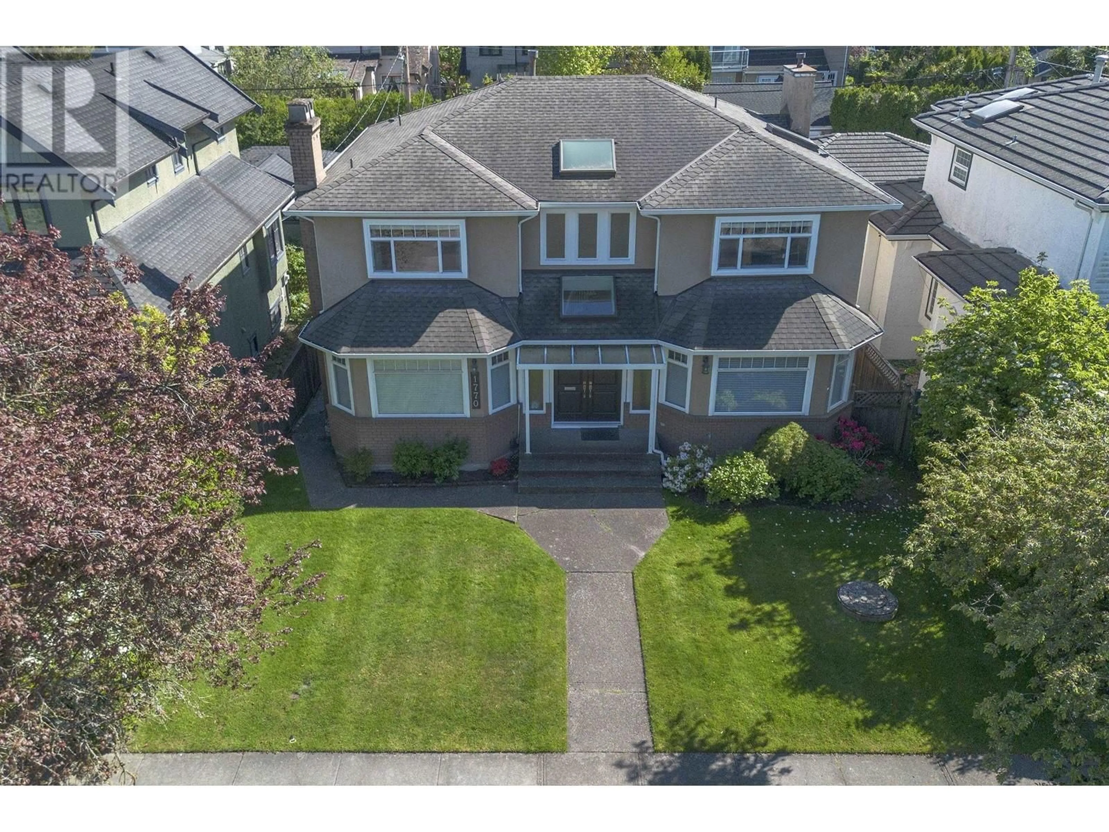 A pic from outside/outdoor area/front of a property/back of a property/a pic from drone, street for 1770 58TH AVENUE, Vancouver British Columbia V6P1W9