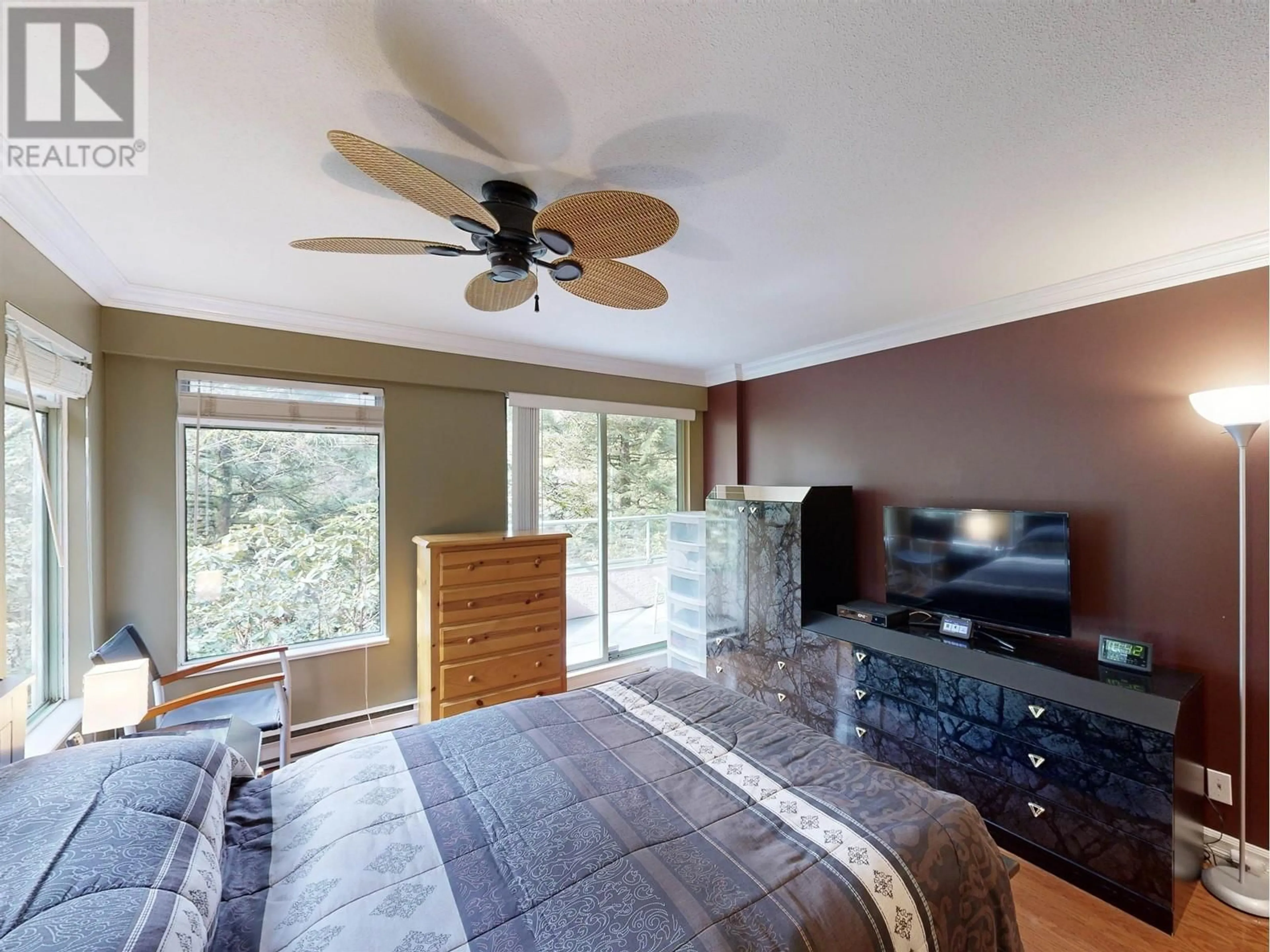 Bedroom with bed, wood/laminate floor for 204 - 6737 STATION HILL COURT, Burnaby British Columbia V3N4V2
