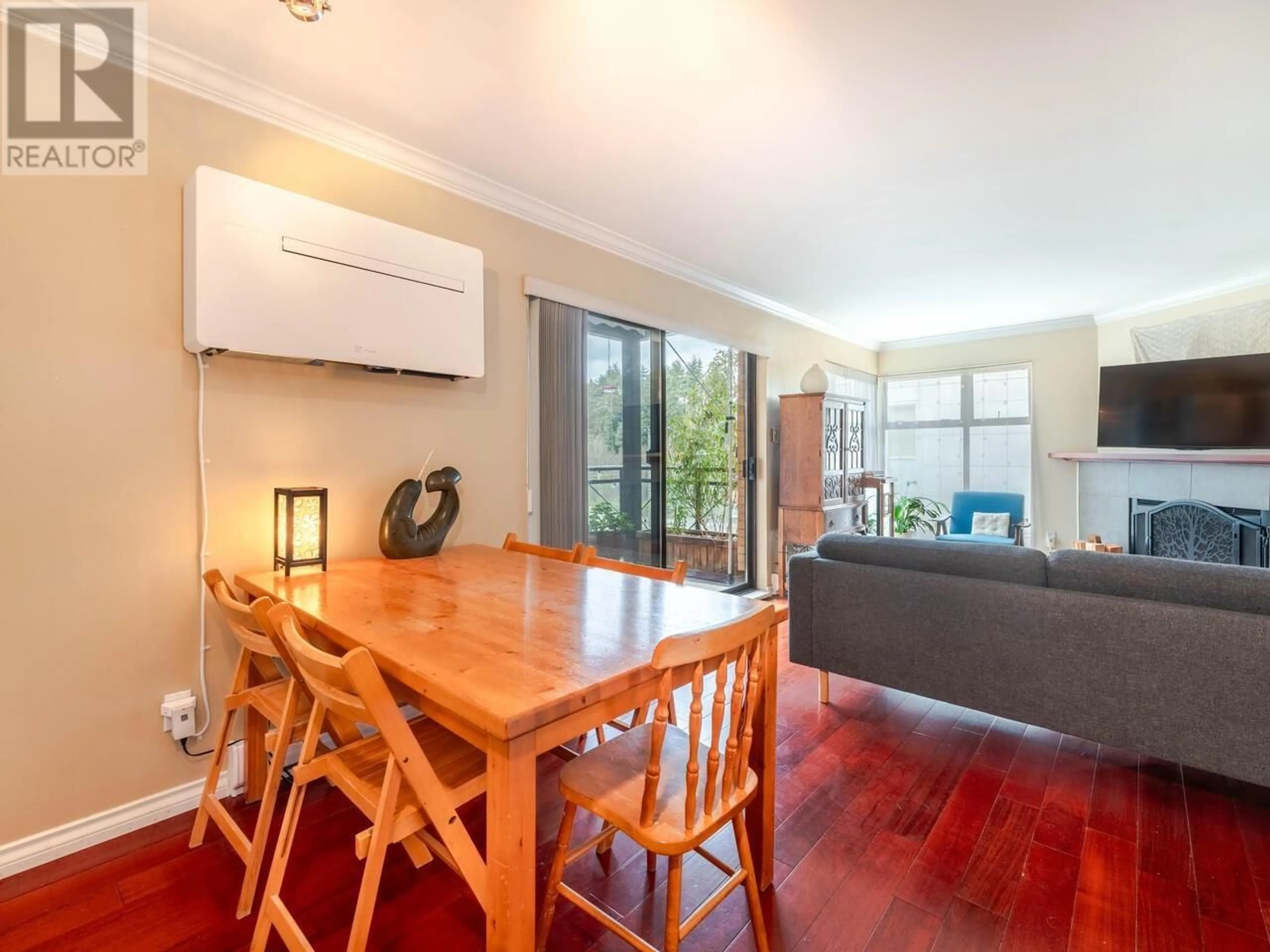 Dining room, wood/laminate floor for 204 - 777 7TH AVENUE, Vancouver British Columbia V5Z1B9