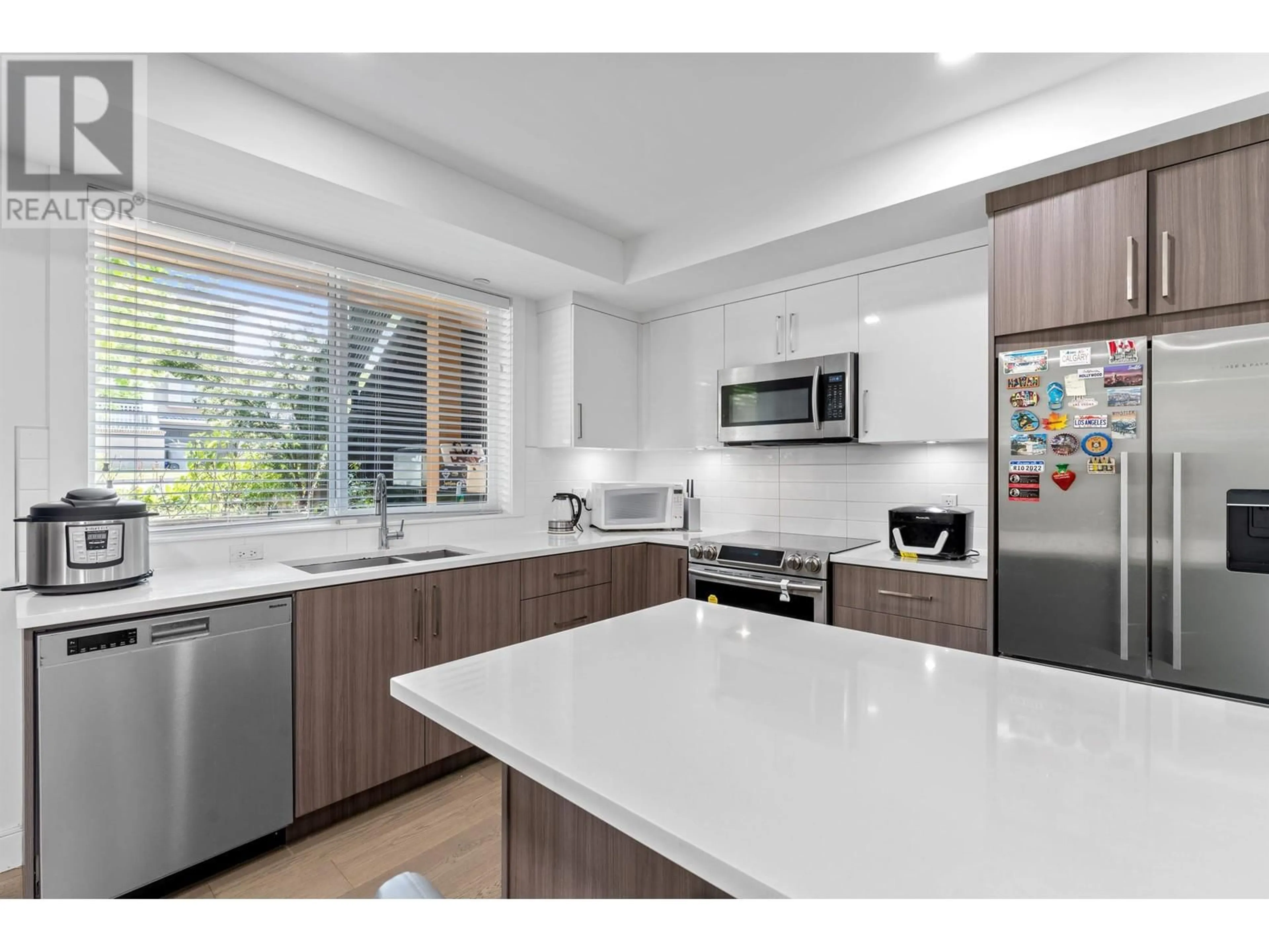 Open concept kitchen, ceramic/tile floor for 2388 34TH AVENUE, Vancouver British Columbia V5R0H4