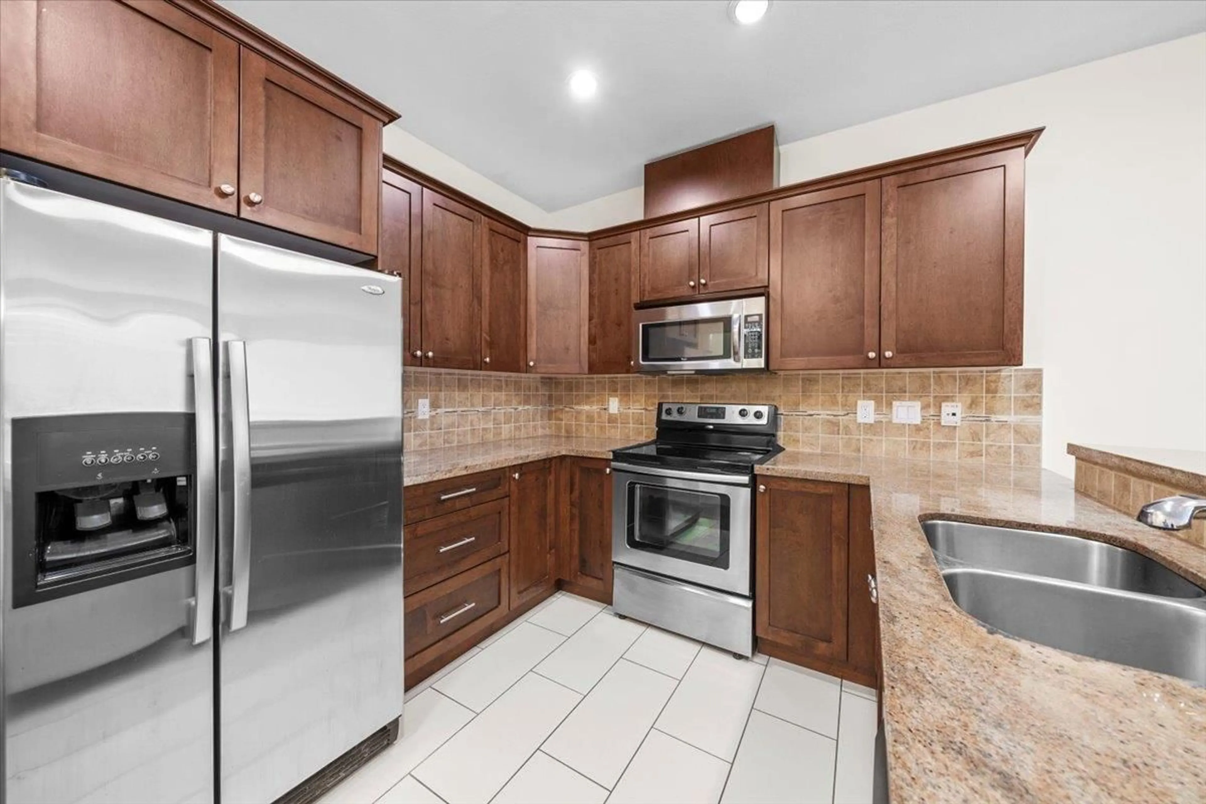 Standard kitchen, ceramic/tile floor for 305 - 14333 104, Surrey British Columbia V3T0E1