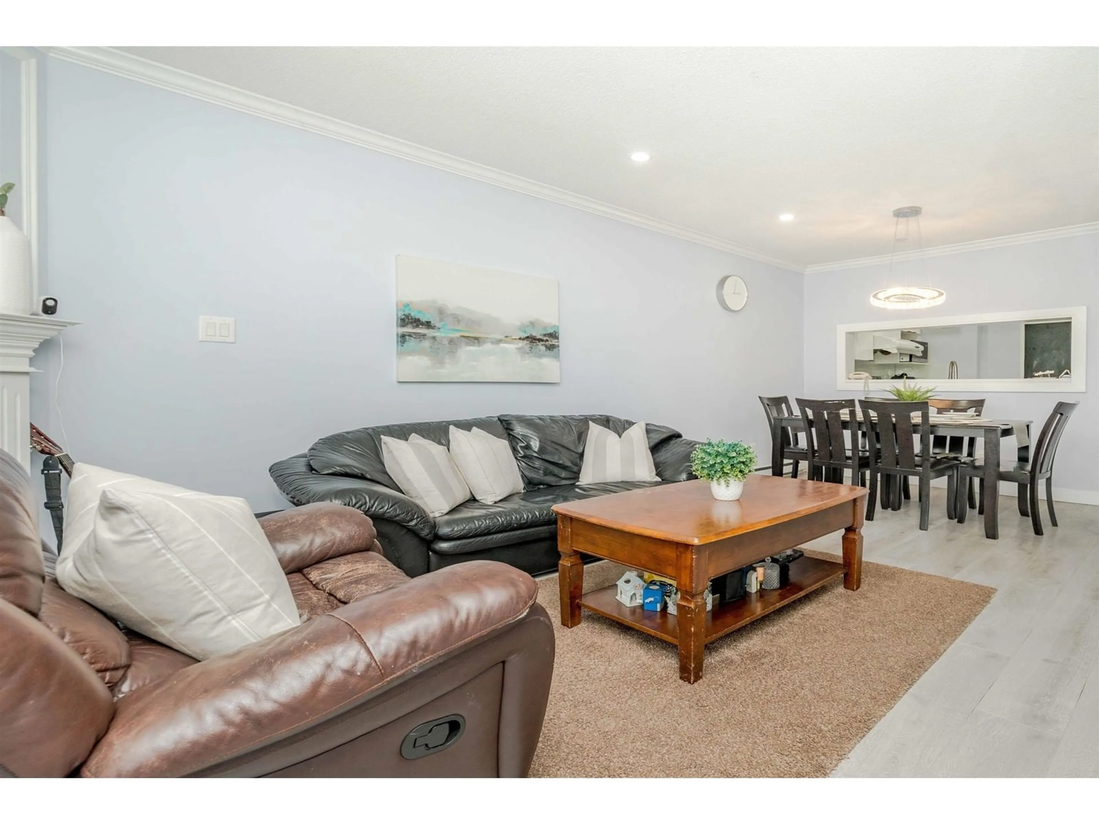 Living room with furniture, wood/laminate floor for 312 - 16137 83, Surrey British Columbia V4N0N1