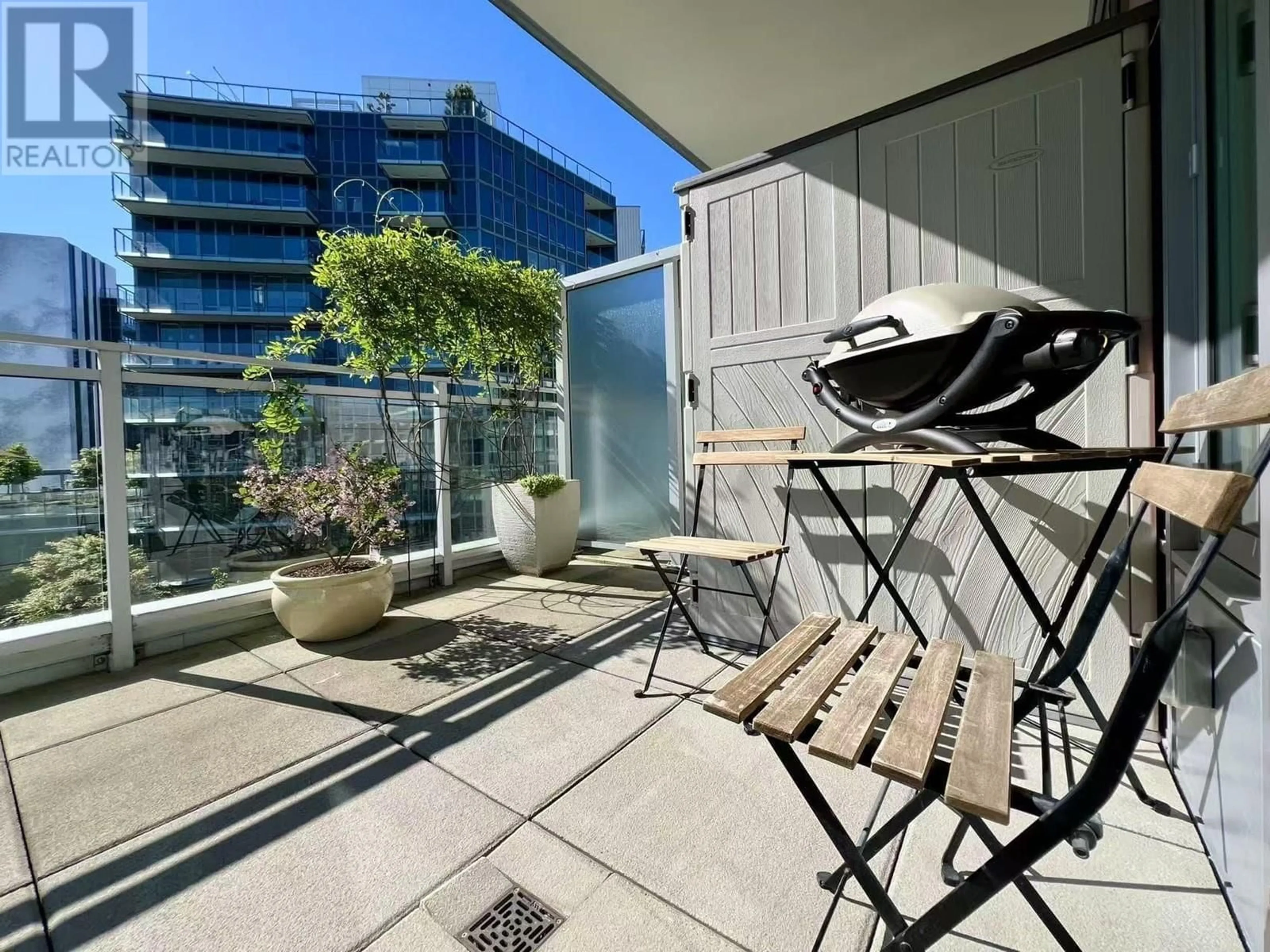 Patio, city buildings view from balcony for 806 - 8628 HAZELBRIDGE WAY, Richmond British Columbia V6X0R5
