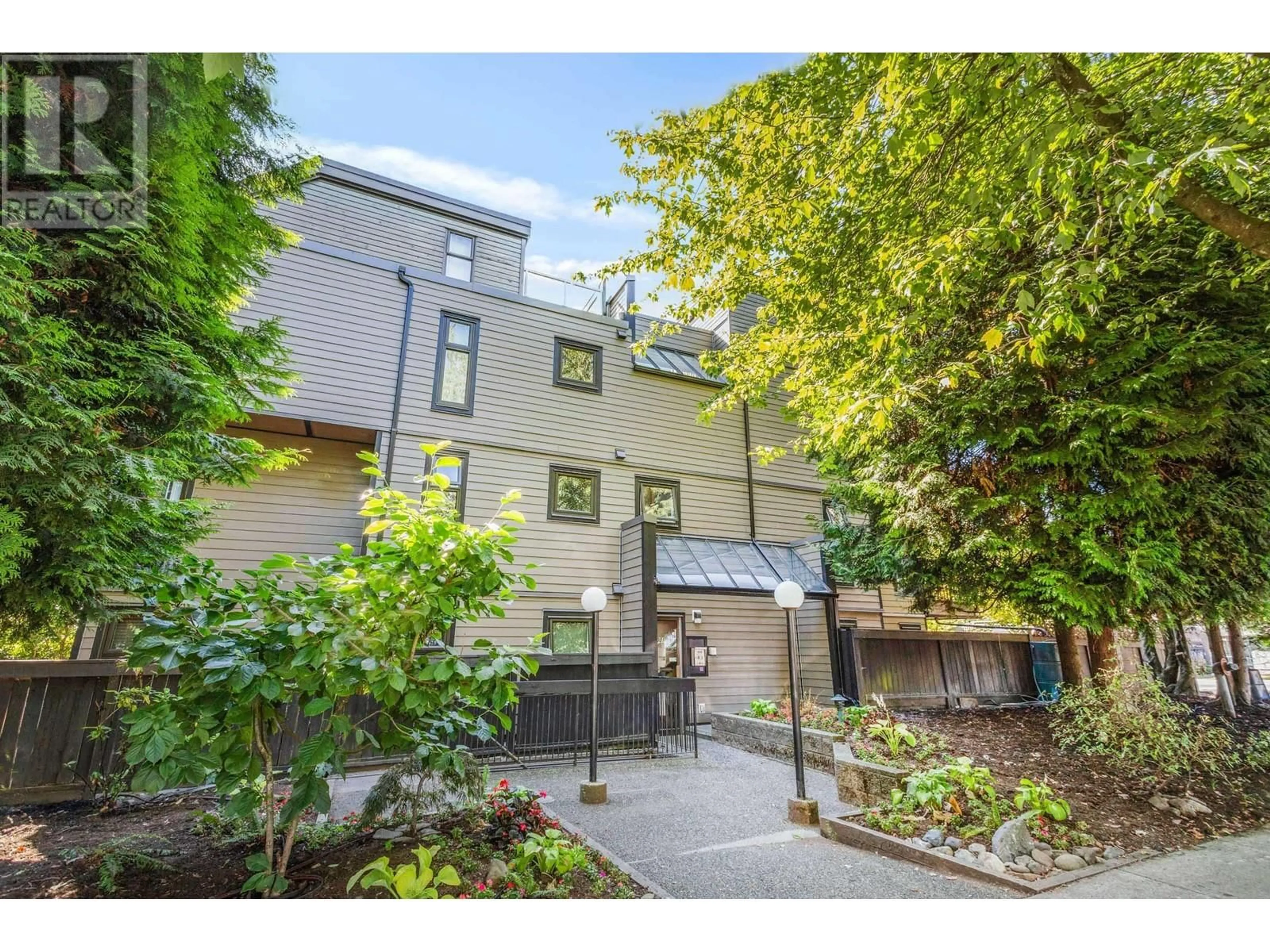 A pic from outside/outdoor area/front of a property/back of a property/a pic from drone, street for 301 - 2001 BALSAM STREET, Vancouver British Columbia V6K4L6